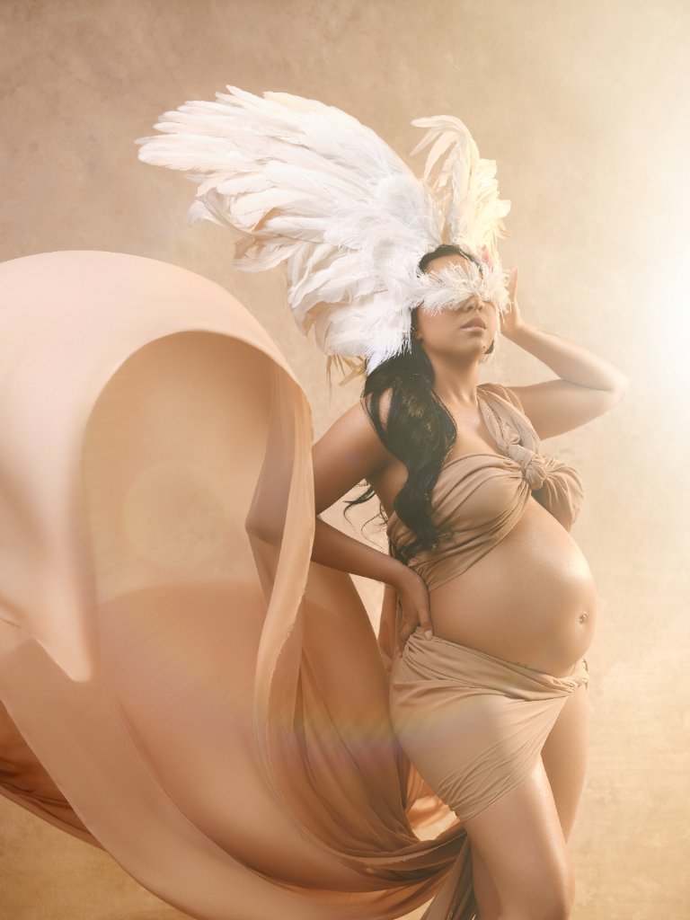 Breshaé feather headdress maternity