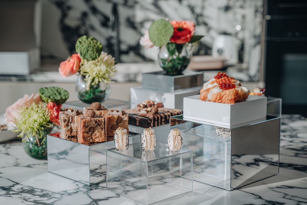 Elegant catering spread with desserts