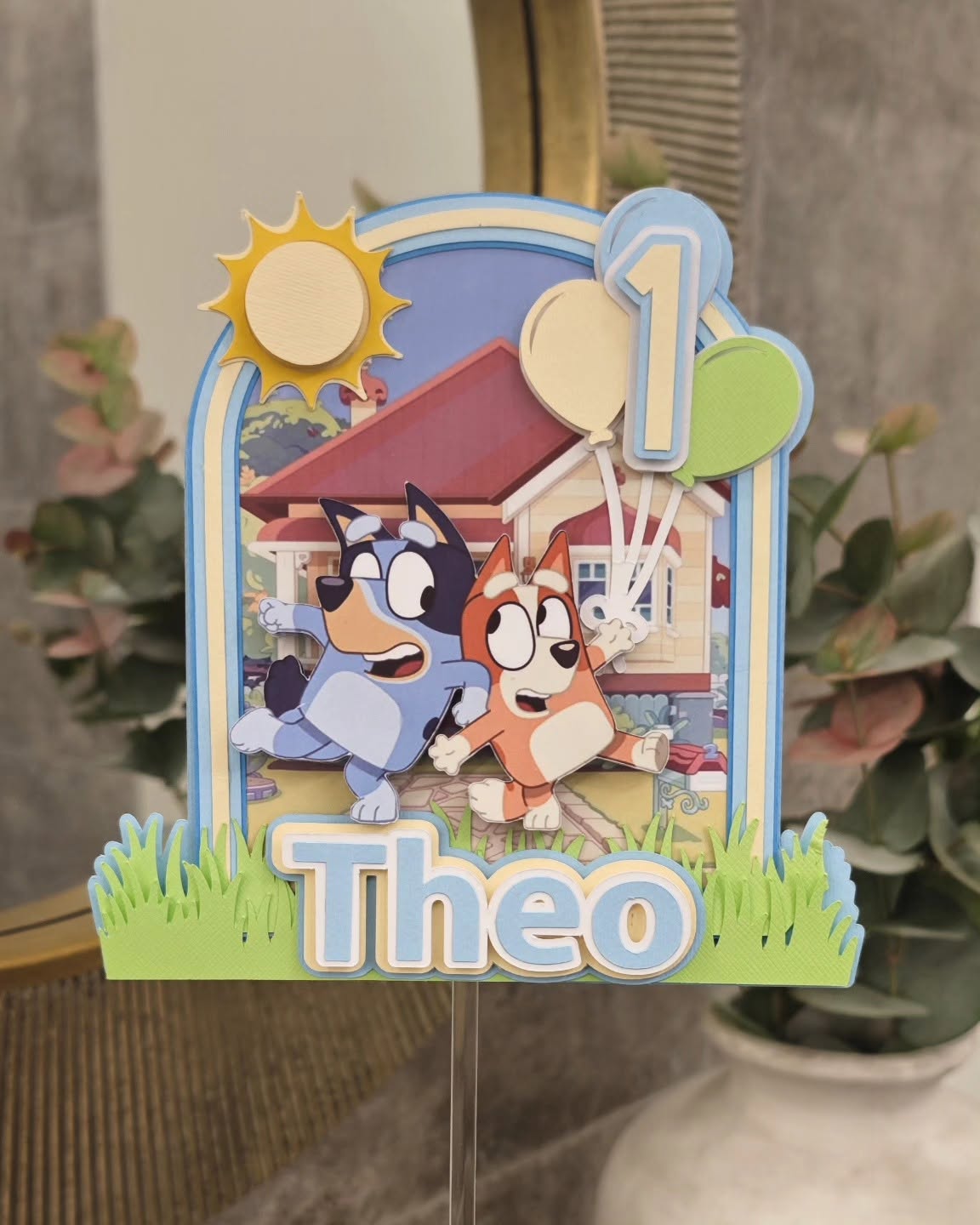 Hand-layered, fully personalised — Bluey & Bingo for Theo's 1st birthday.