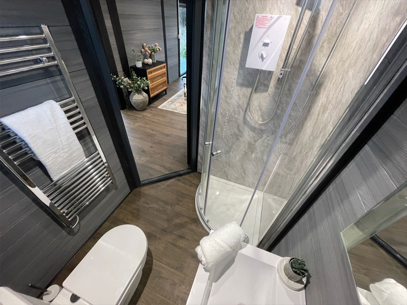 Compact WC in garden room — toilet and basin