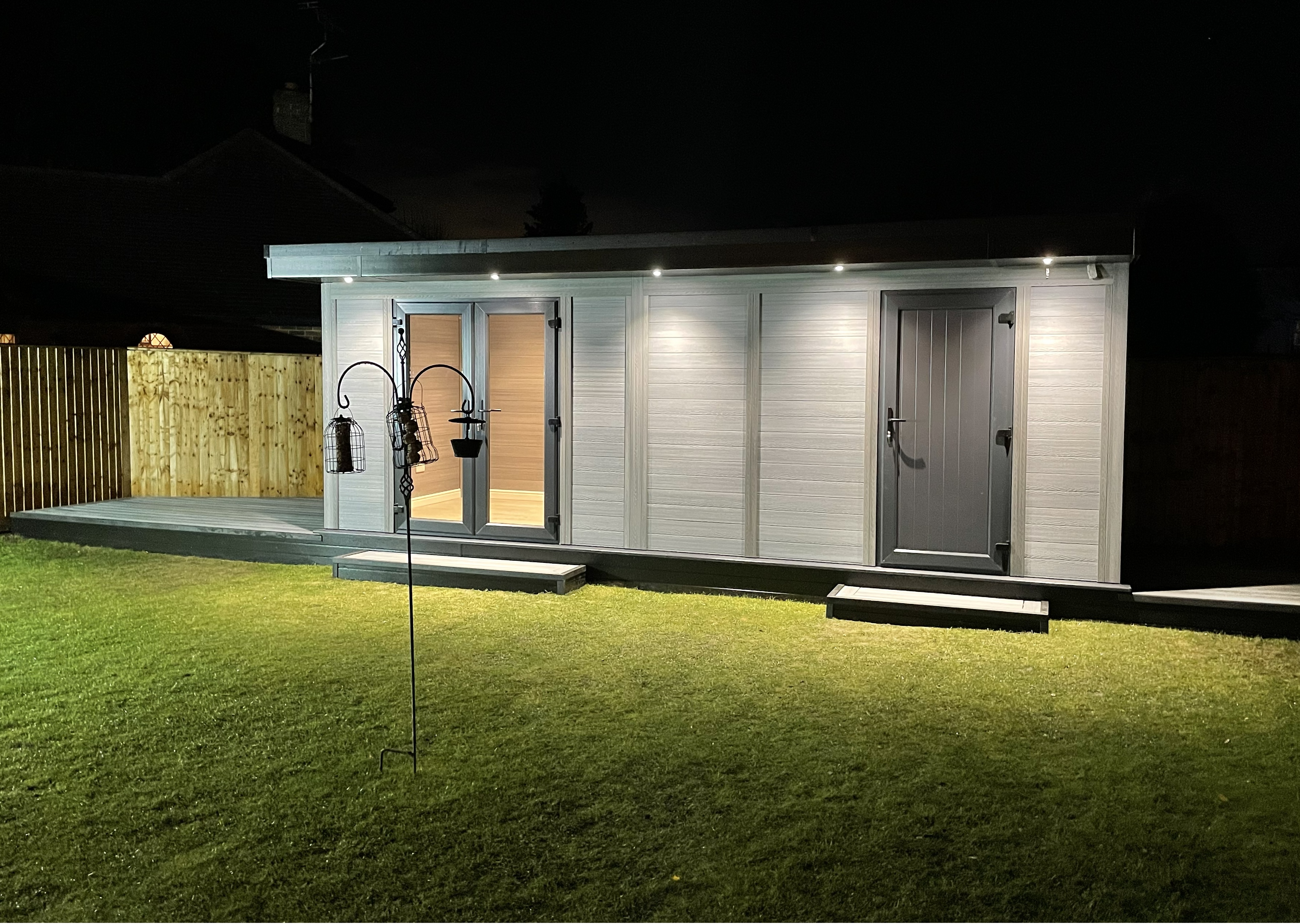 Storage side of garden room — bikes and tools neatly stored