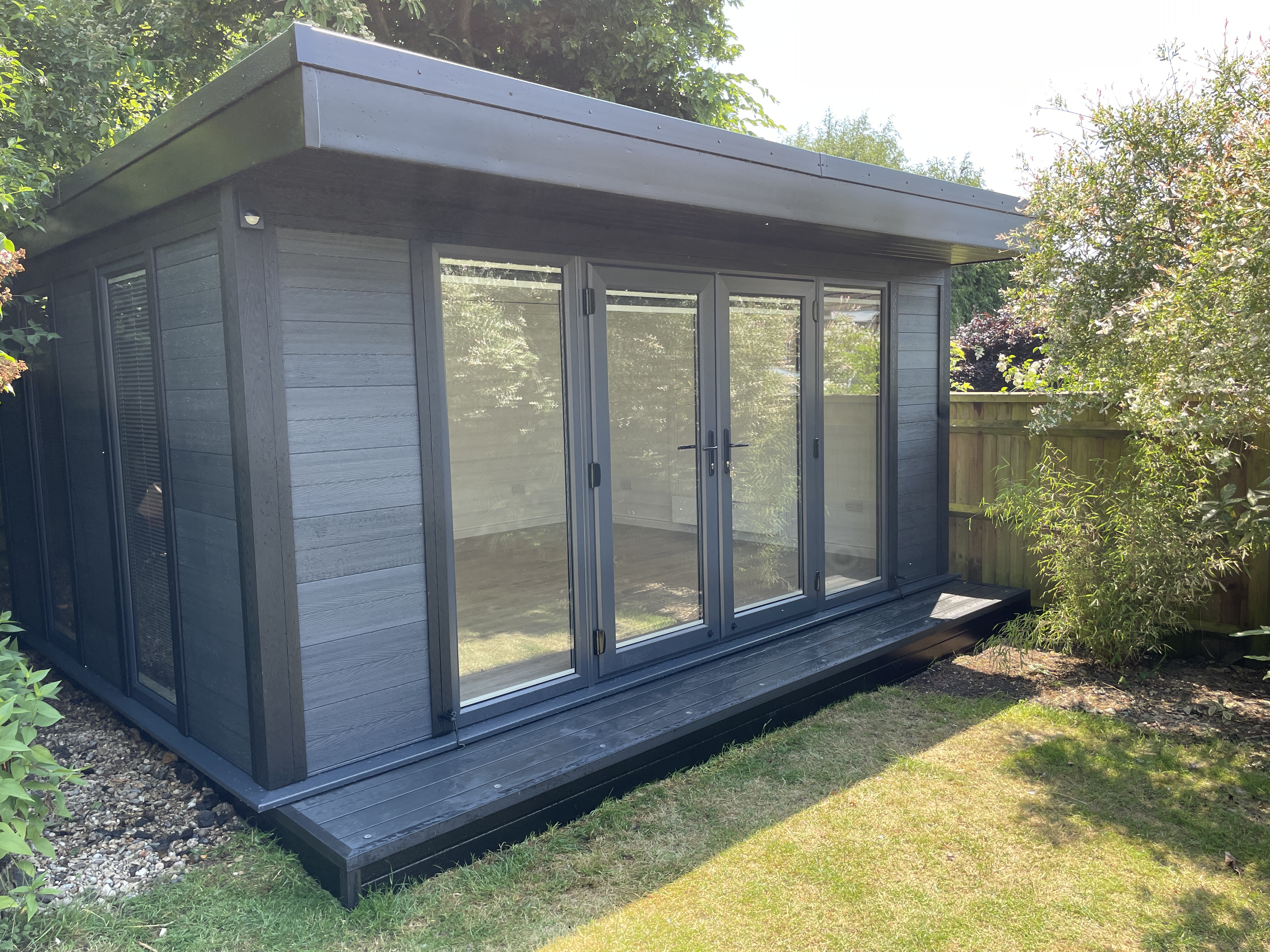 Completed prefab garden room in garden