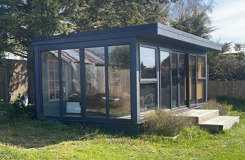 Glazed garden room with floor-to-ceiling windows