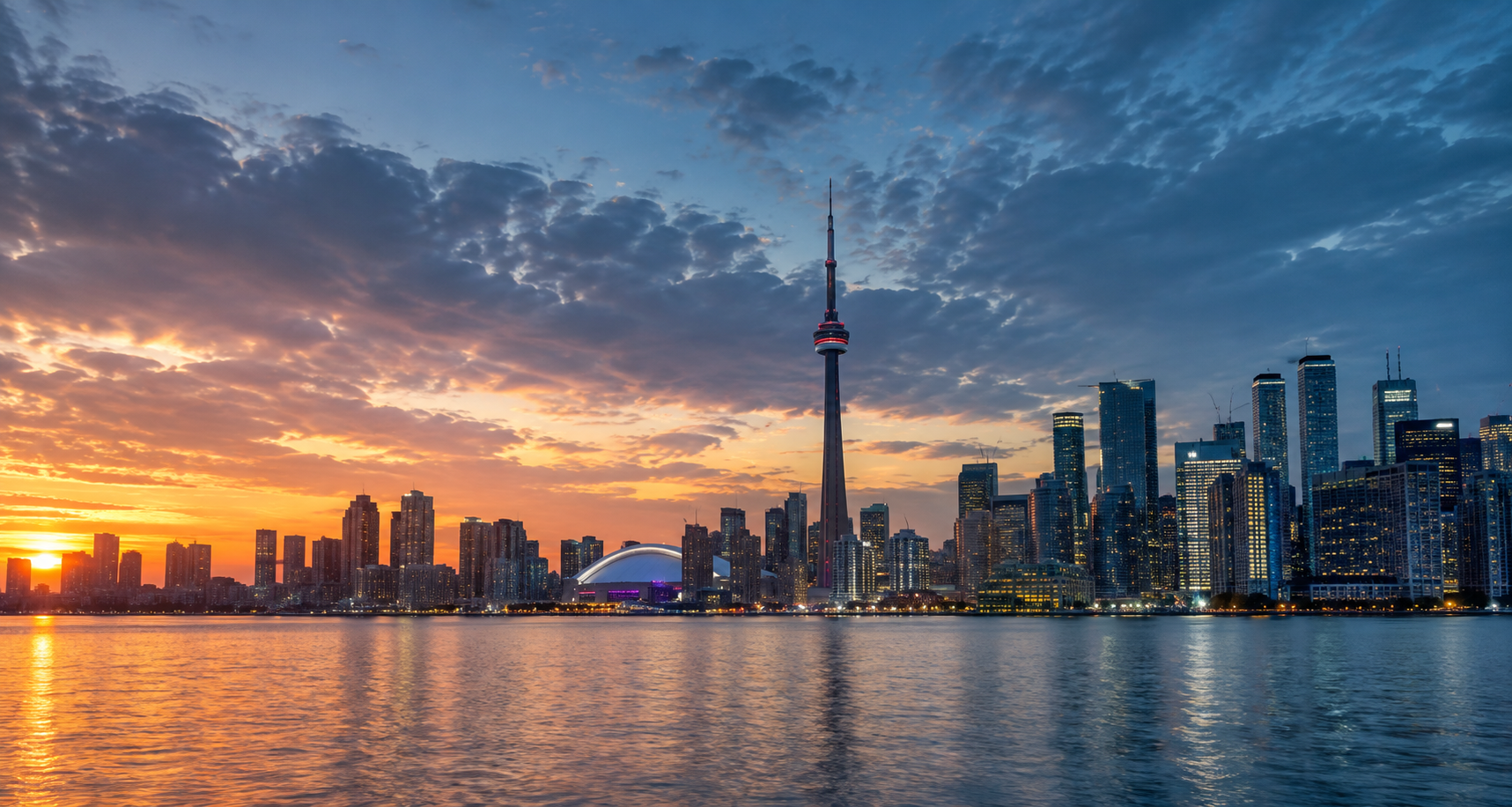 Toronto skyline at blue hour featuring the CN Tower