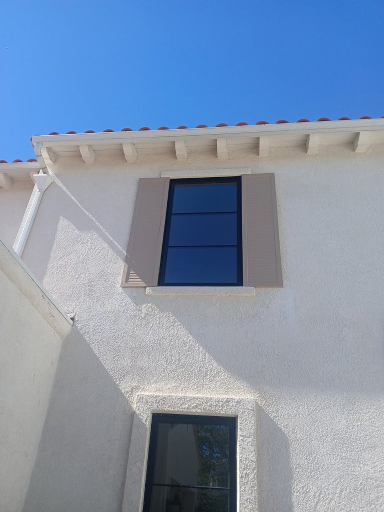 Exterior stucco and window detail after painting Los Angeles