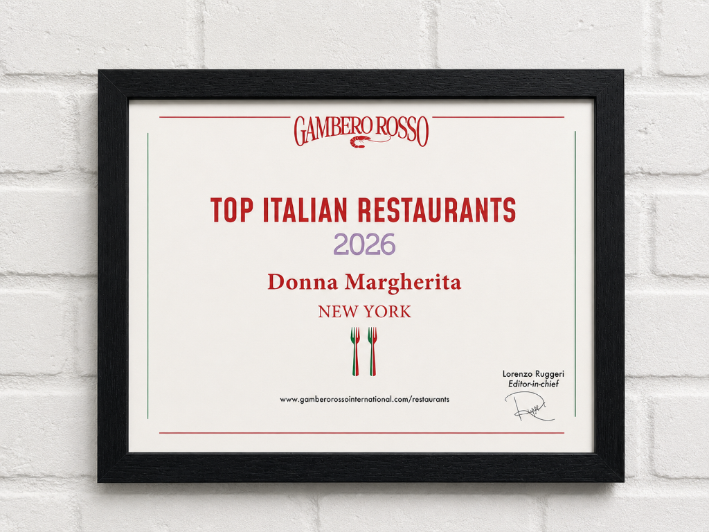 Gambero Rosso Top Italian Restaurants in the World 2026 award badge
