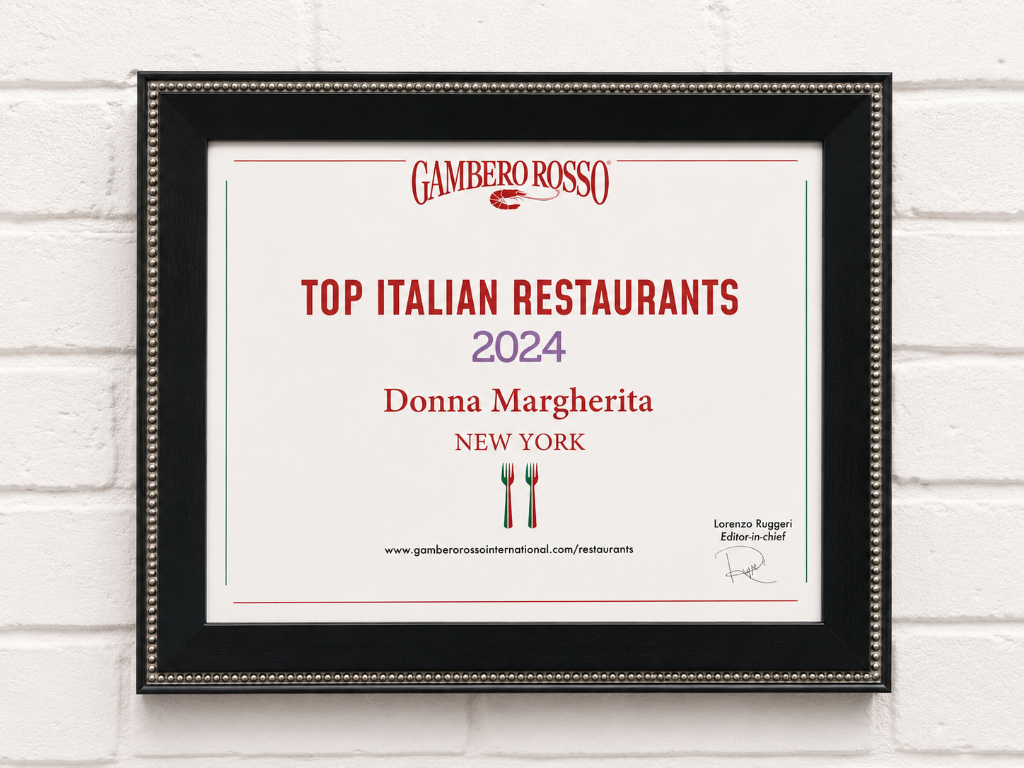 Gambero Rosso Top Italian Restaurants in the World 2024 award badge