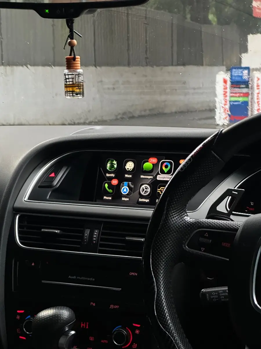 Wireless CarPlay home screen on the factory display of an Audi A5 we installed