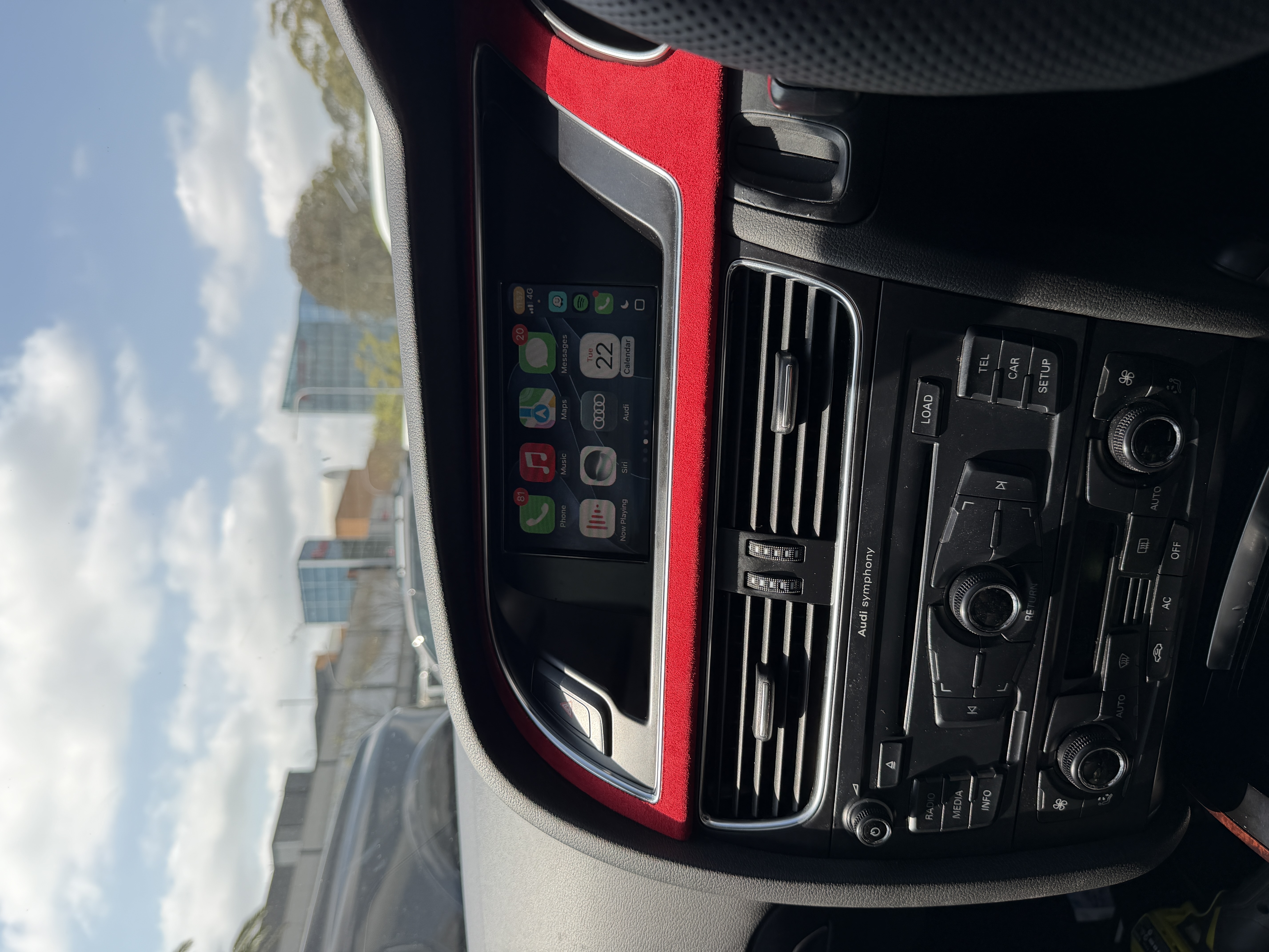 CarPlay retrofit with red Alcantara dash trim
