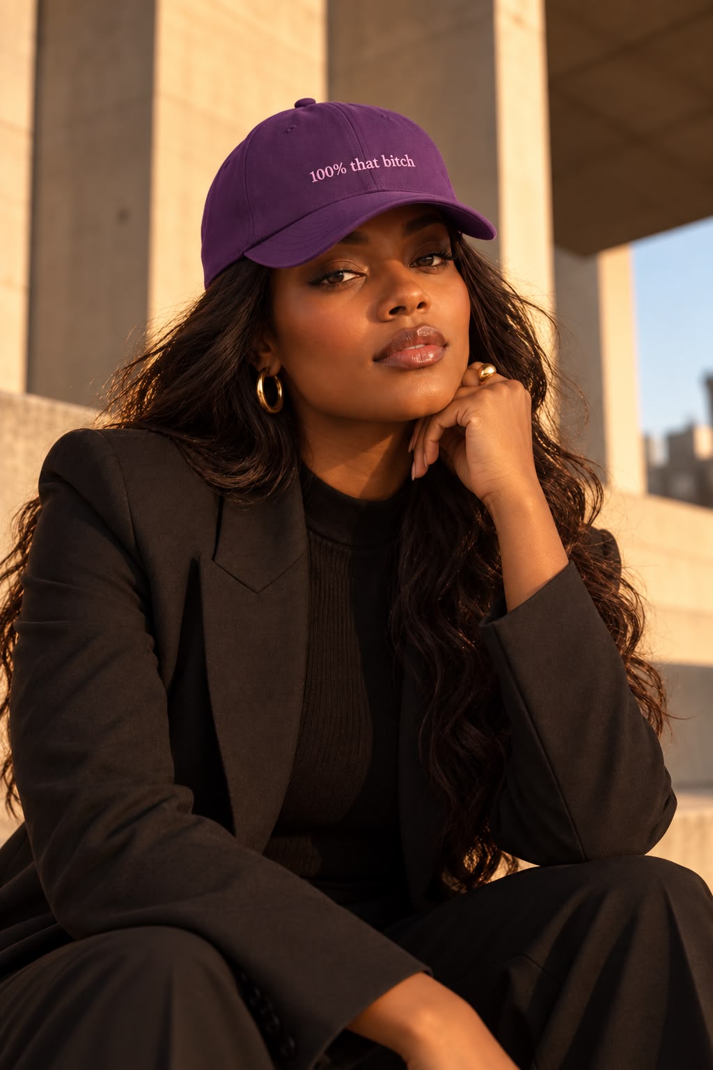 100% that bitch, embroidered on the purple cap