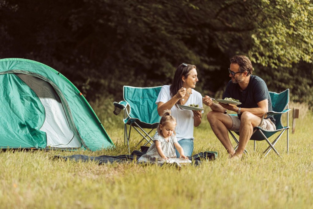 Adult and Family Camping at Night Pastures