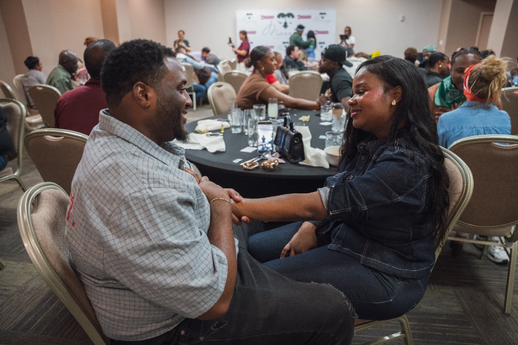 Couple holding hands at a Be Strong Couples Program workshop
