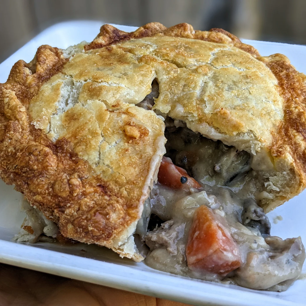 Beef & Guinness Pot Pie — Slow-braised lamb shoulder, root vegetables, pearl barley. Served with our house soda bread.
