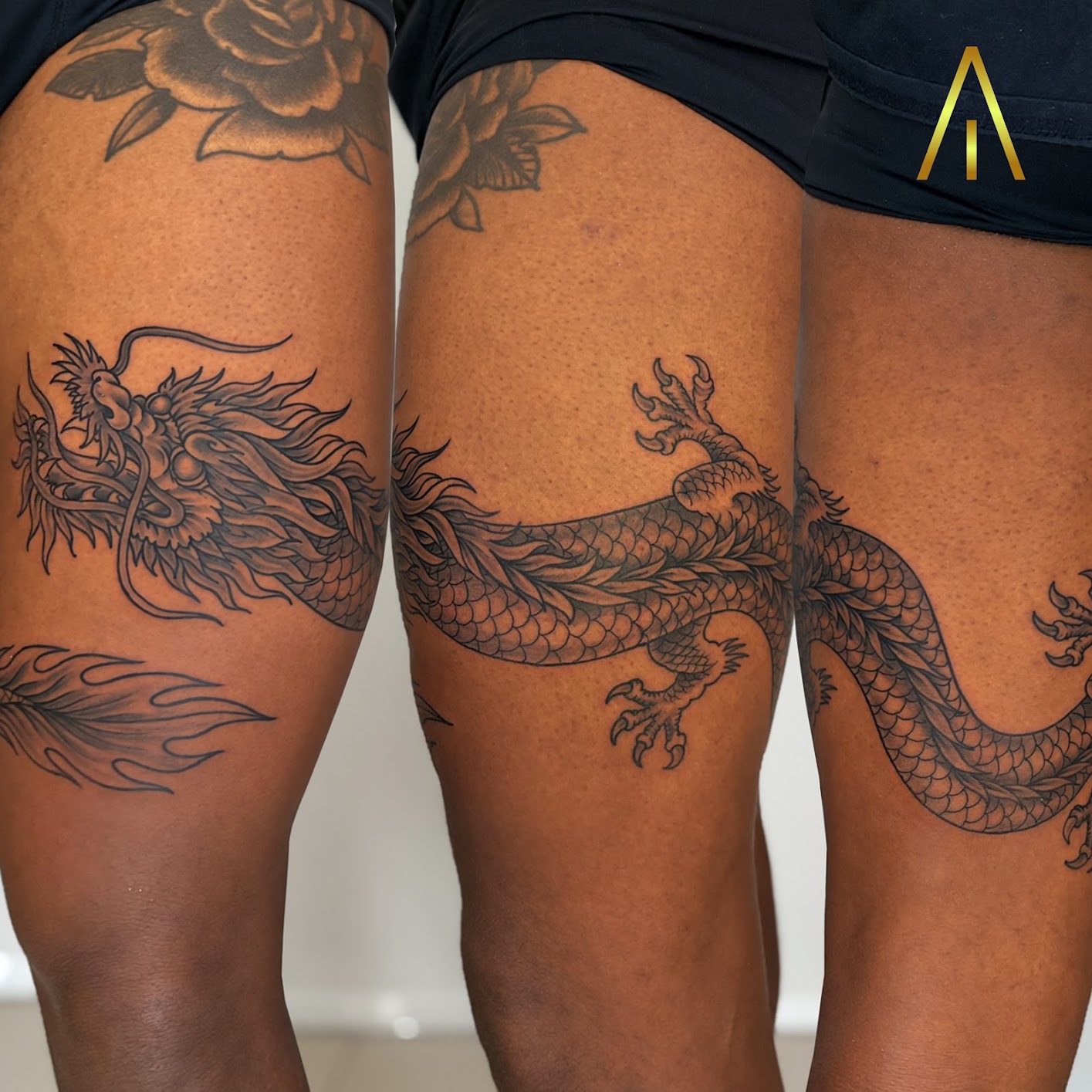 Taely dragon wrapping thigh black and grey tattoo Chiang Mai