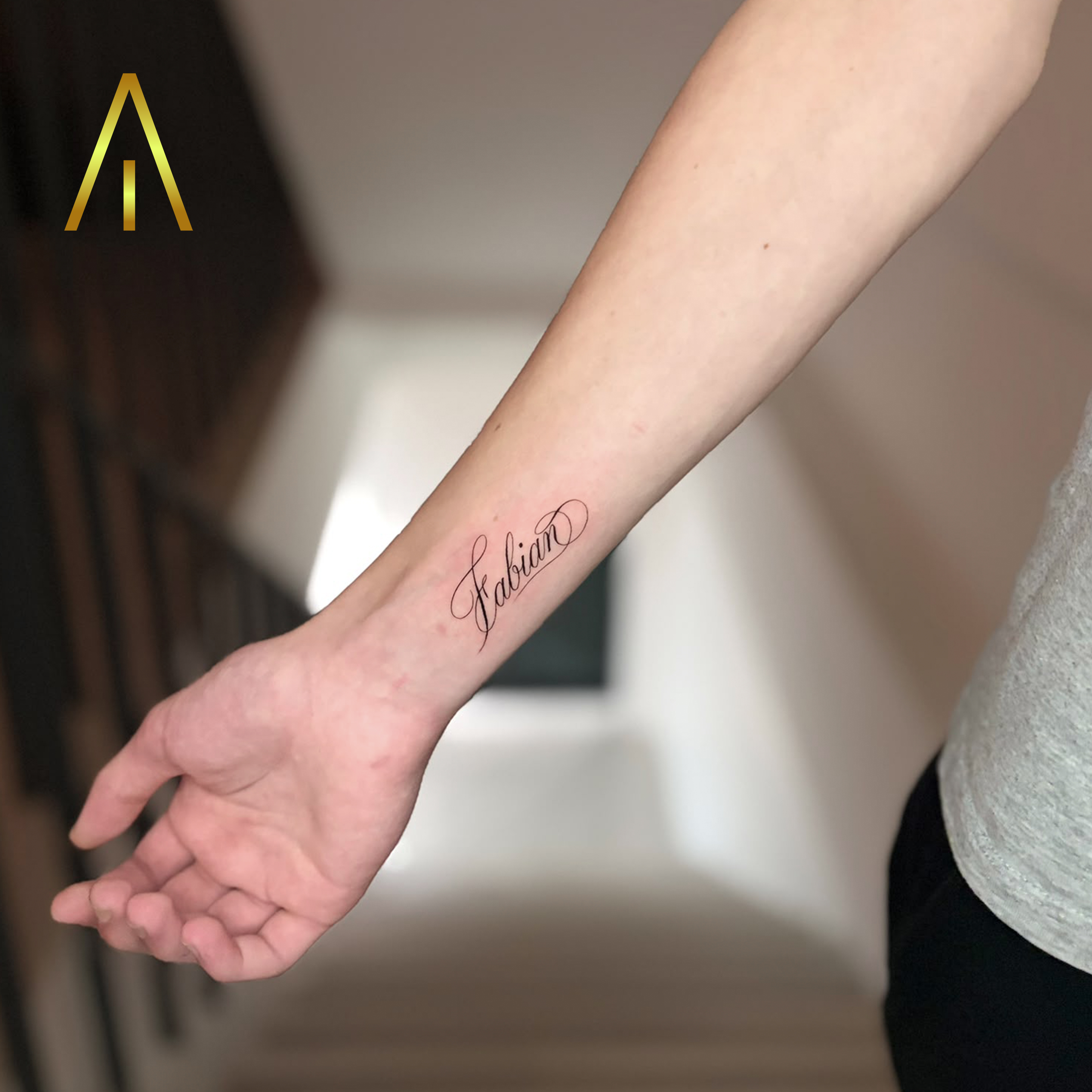 Mimi fine line name script tattoo Chiang Mai