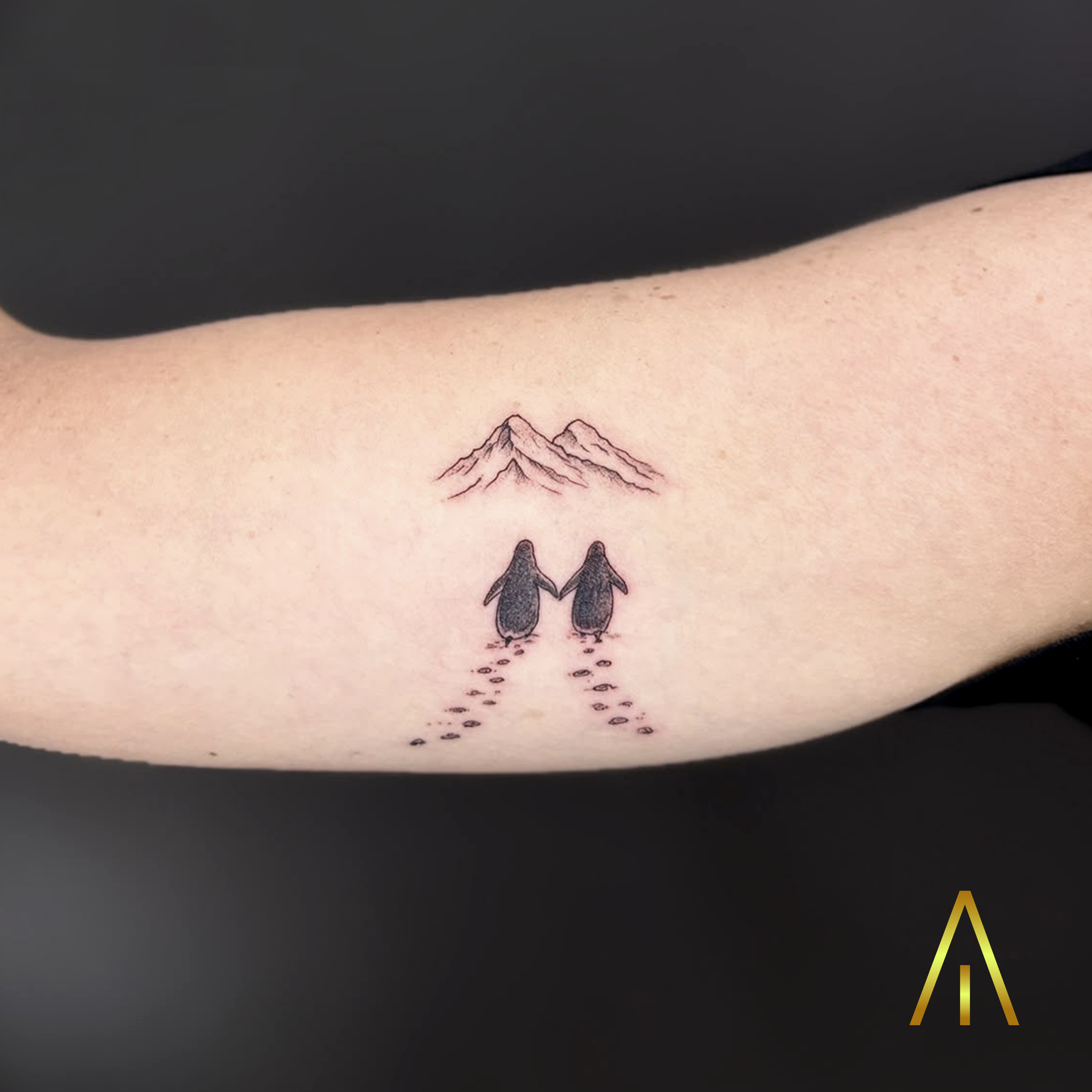 Mimi minimal penguins walking to mountains tattoo Chiang Mai