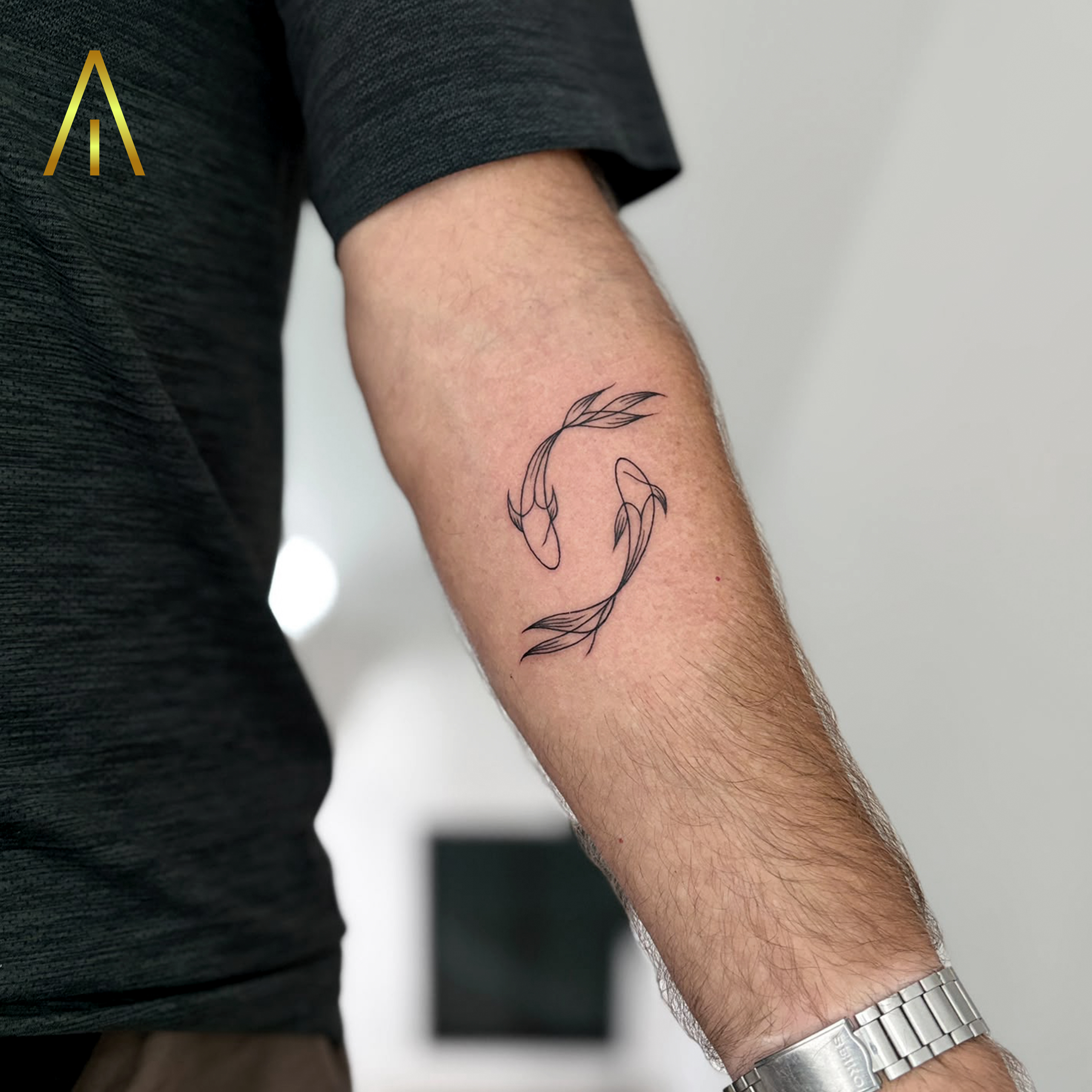 Fine line koi fish yin yang forearm tattoo Chiang Mai