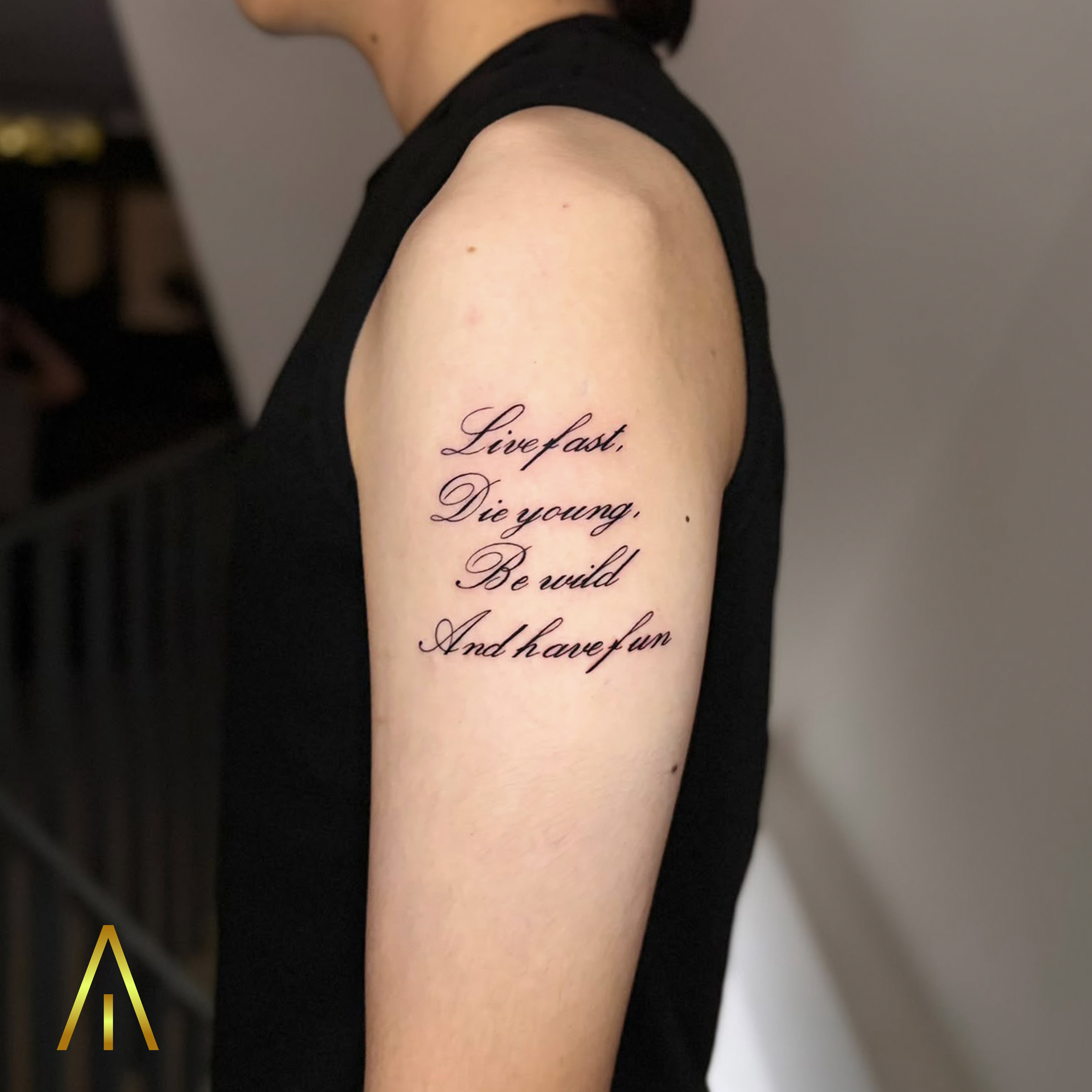 Fine line live fast die young script tattoo Chiang Mai