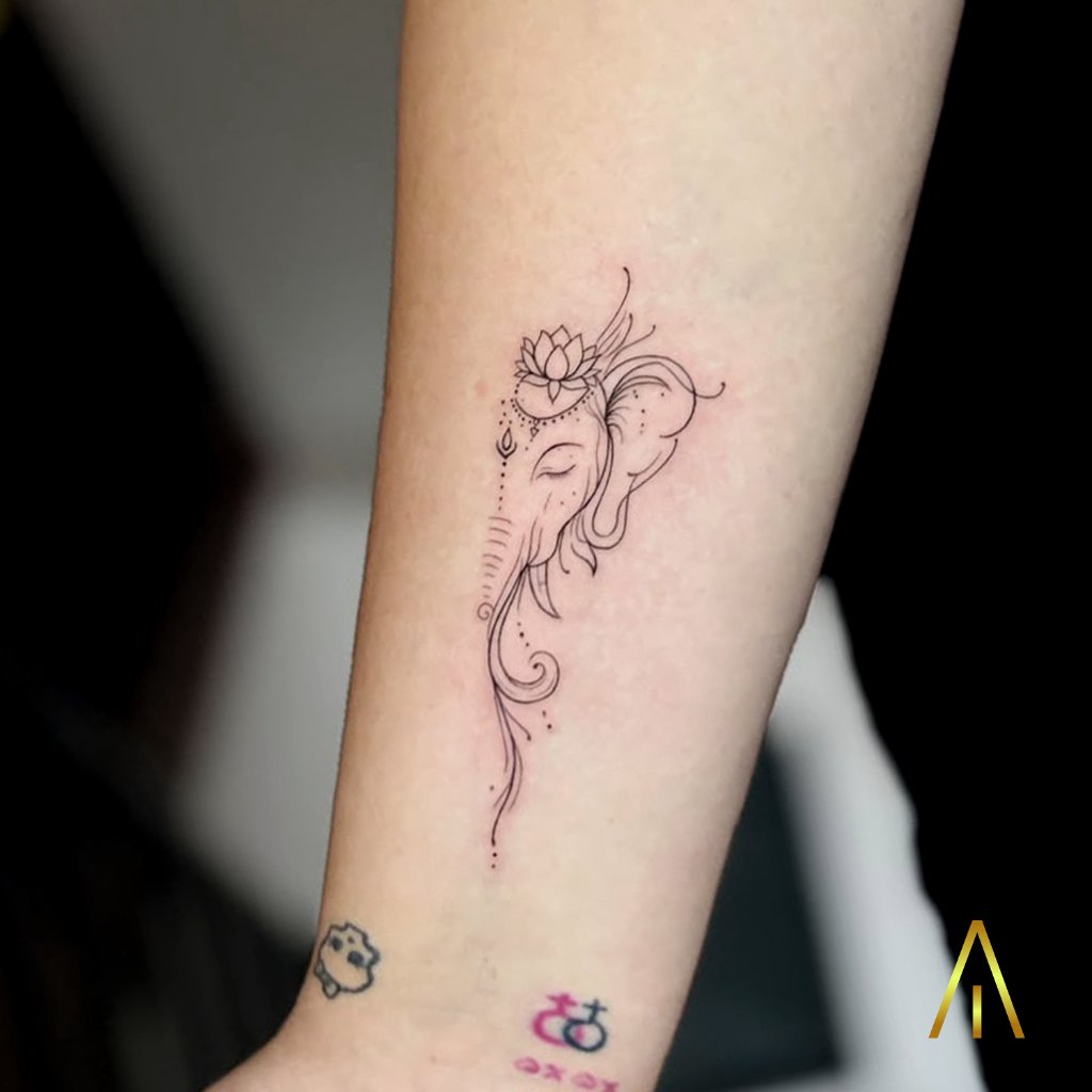 Fine line Ganesha tattoo on the inner forearm, Artisan Ink Chiang Mai
