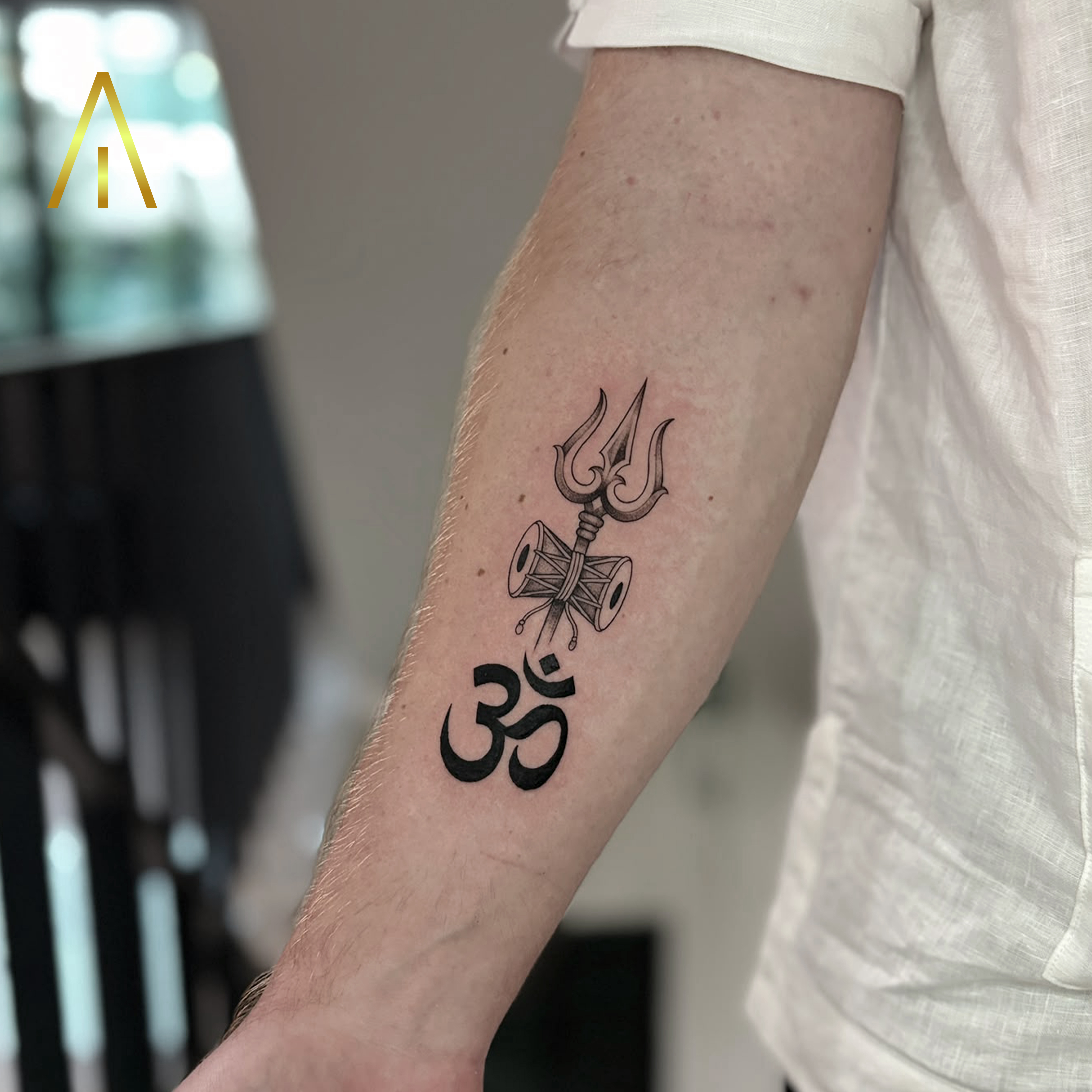 Mimi fine line Trishula Damaru Om forearm tattoo Chiang Mai