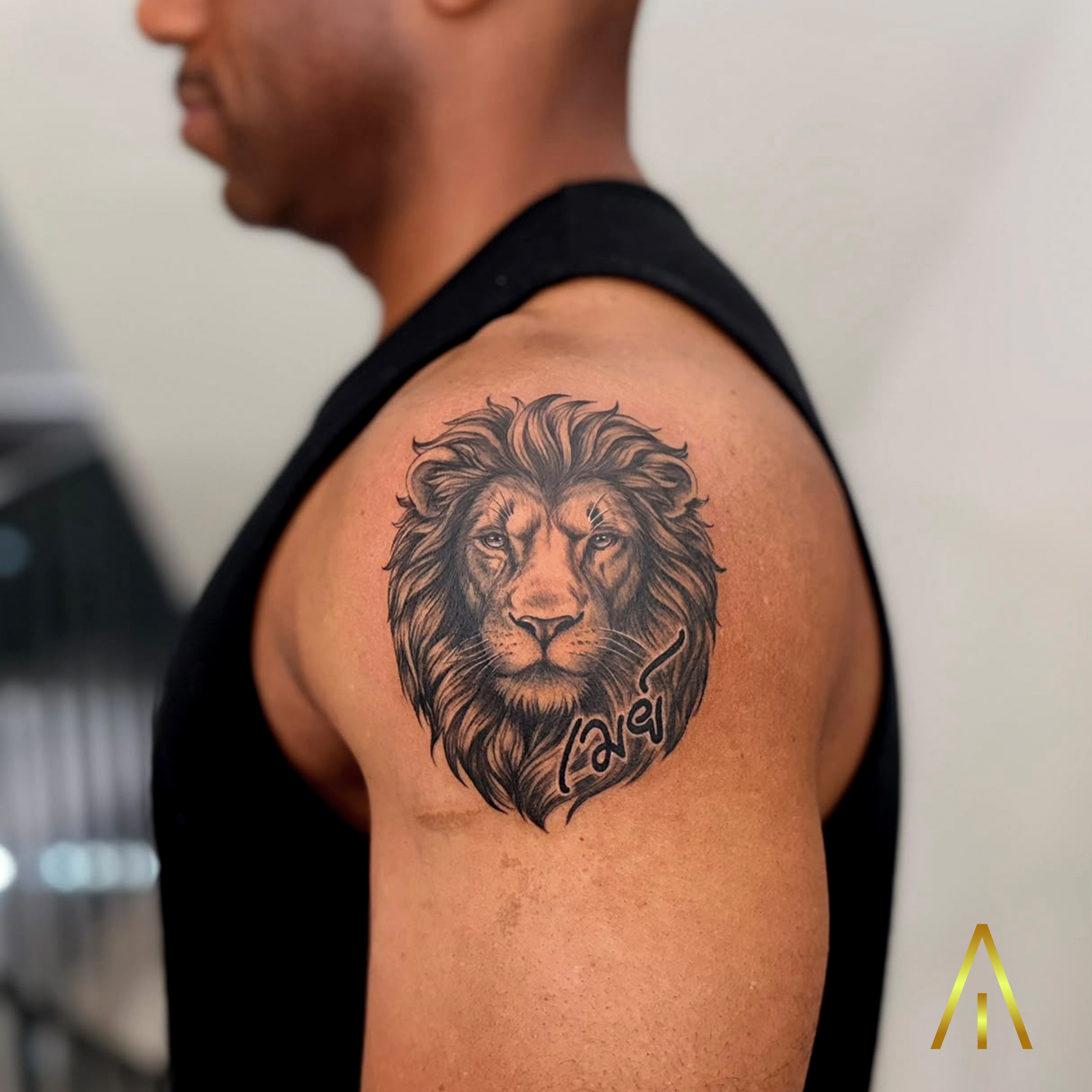 Miaa black and grey lion upper arm tattoo Chiang Mai