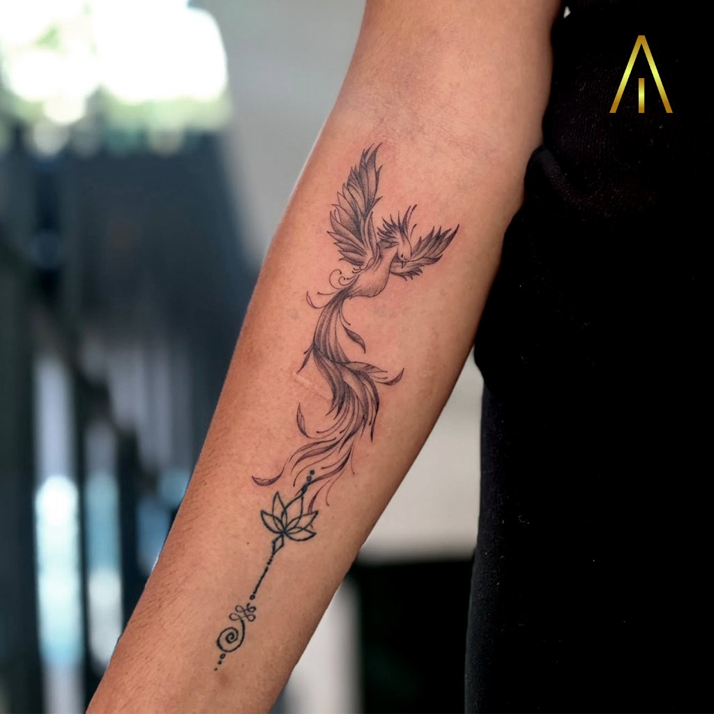 Phoenix lotus unalome fine line forearm tattoo Chiang Mai