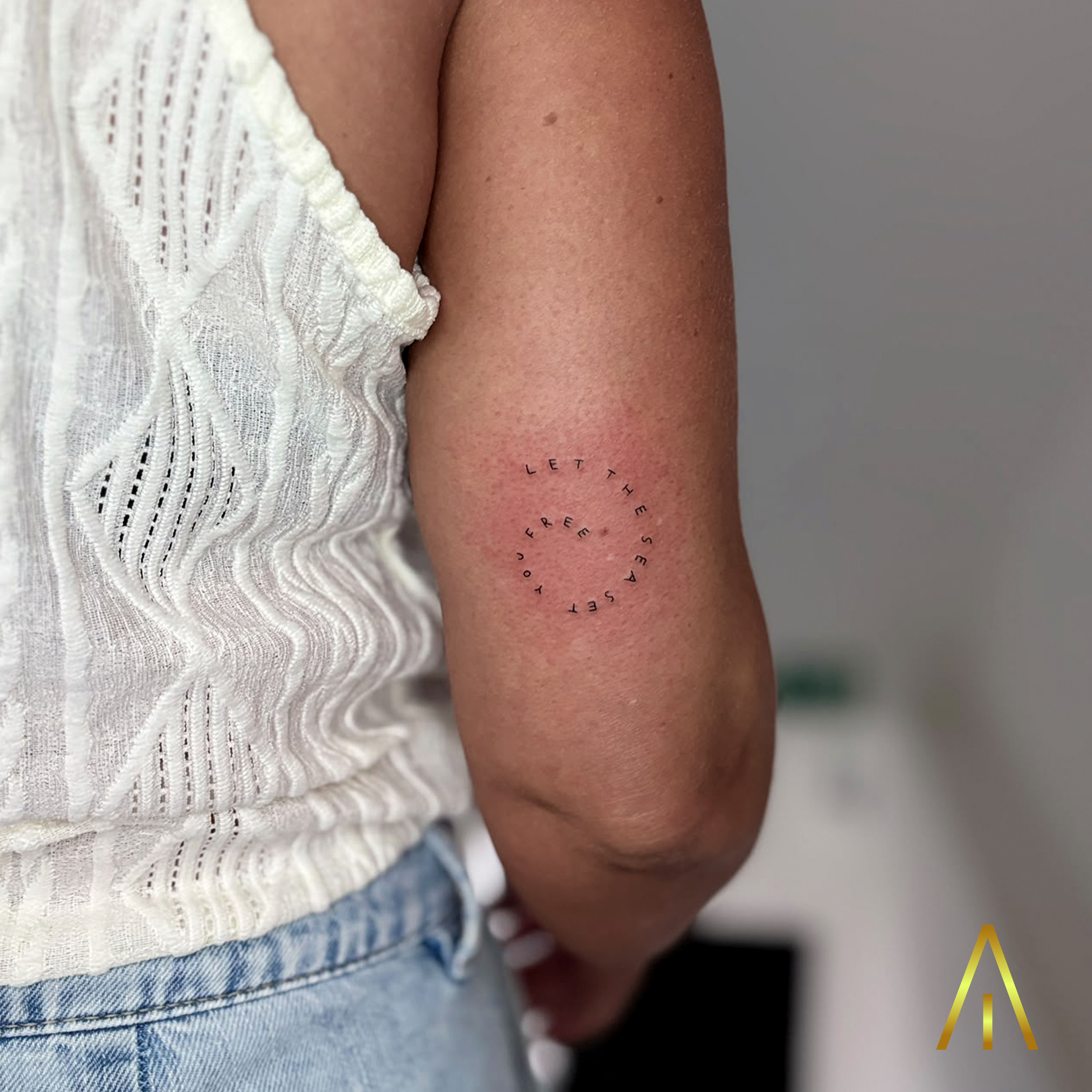 Fine line spiral let the sea set you free text tattoo Chiang Mai
