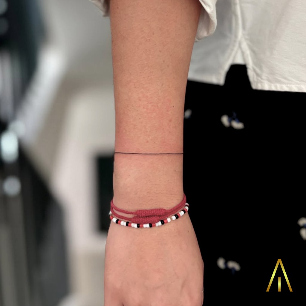 Fine line single line wrist tattoo Chiang Mai