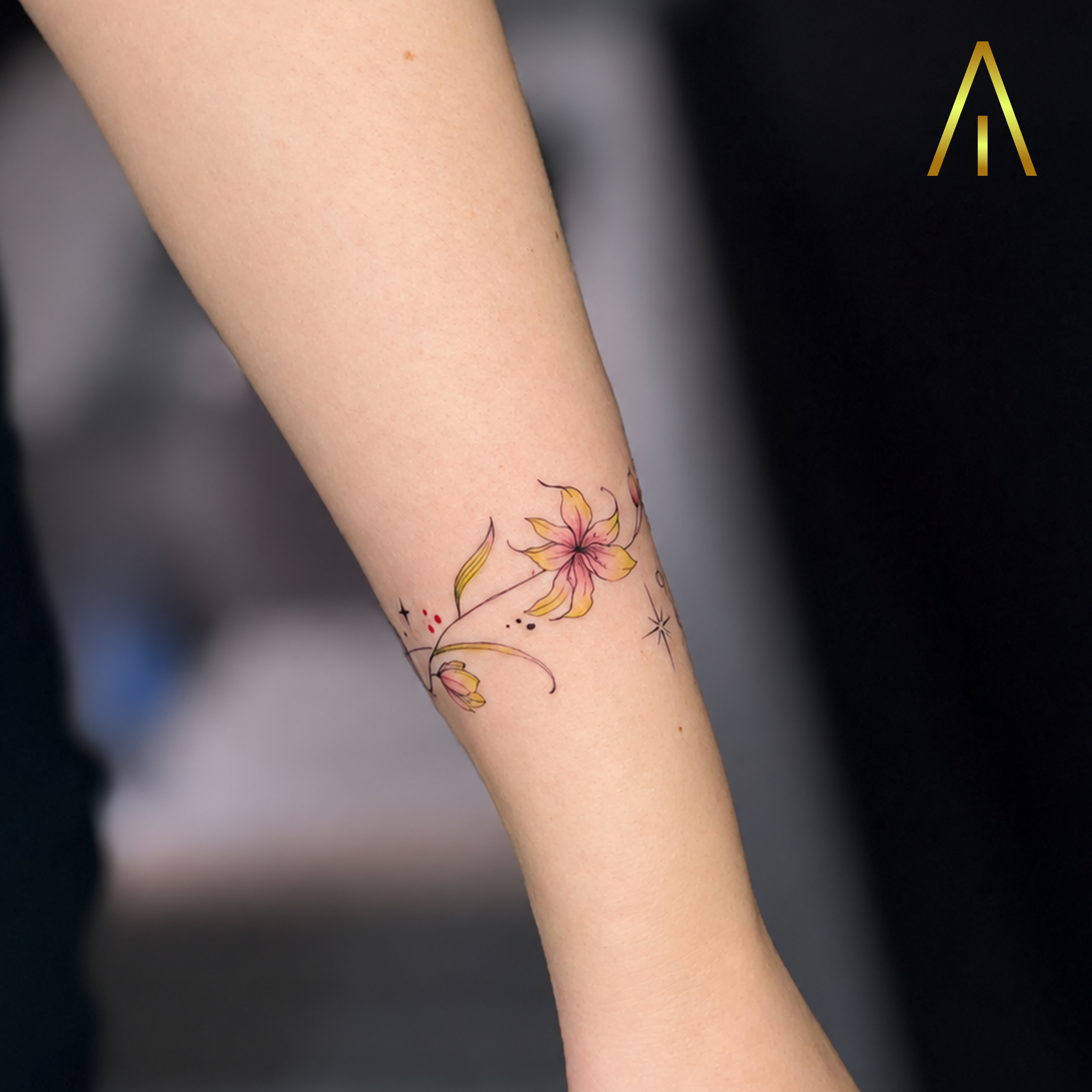 Miaa colour fine line yellow flower forearm tattoo Chiang Mai