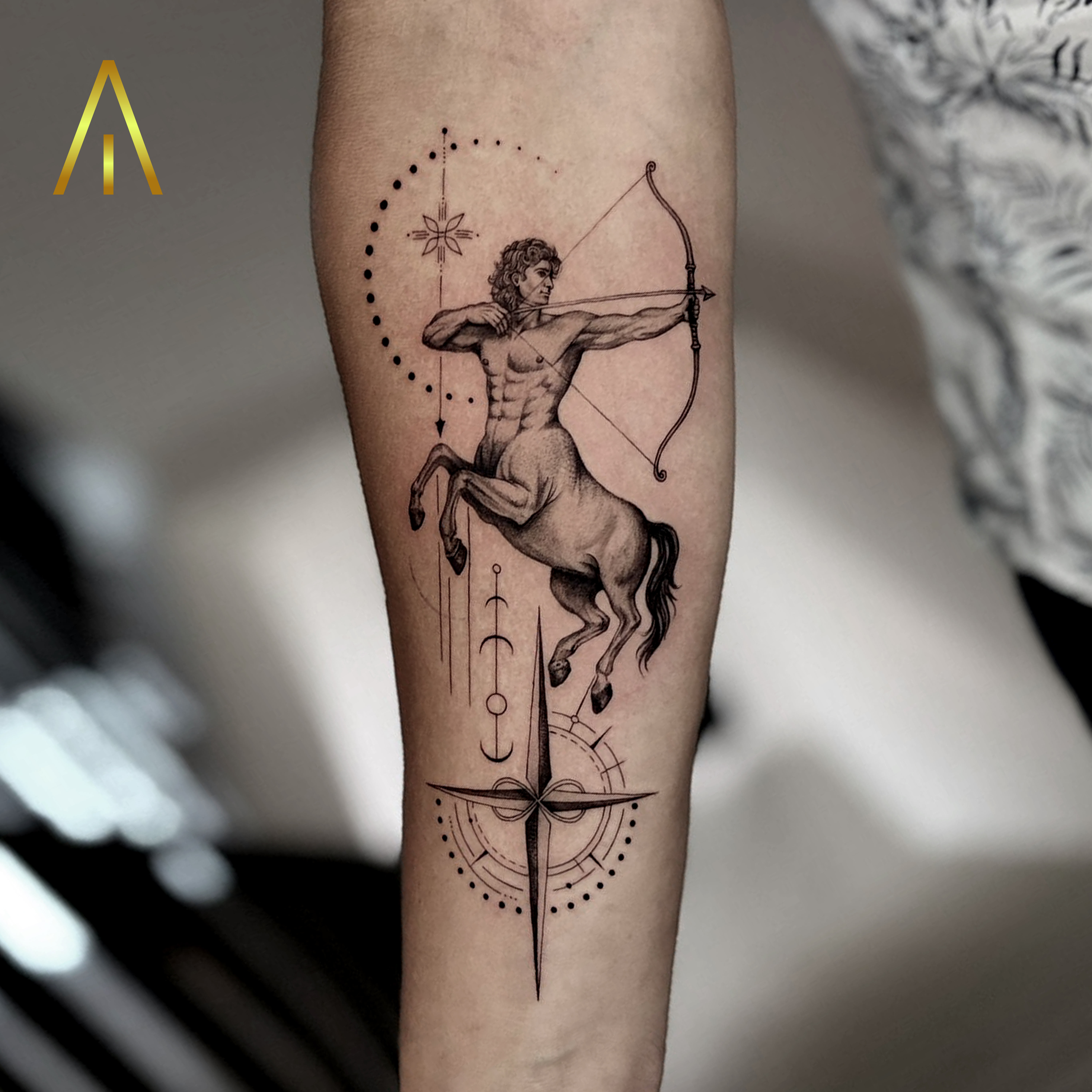 Black and grey centaur archer forearm tattoo Chiang Mai