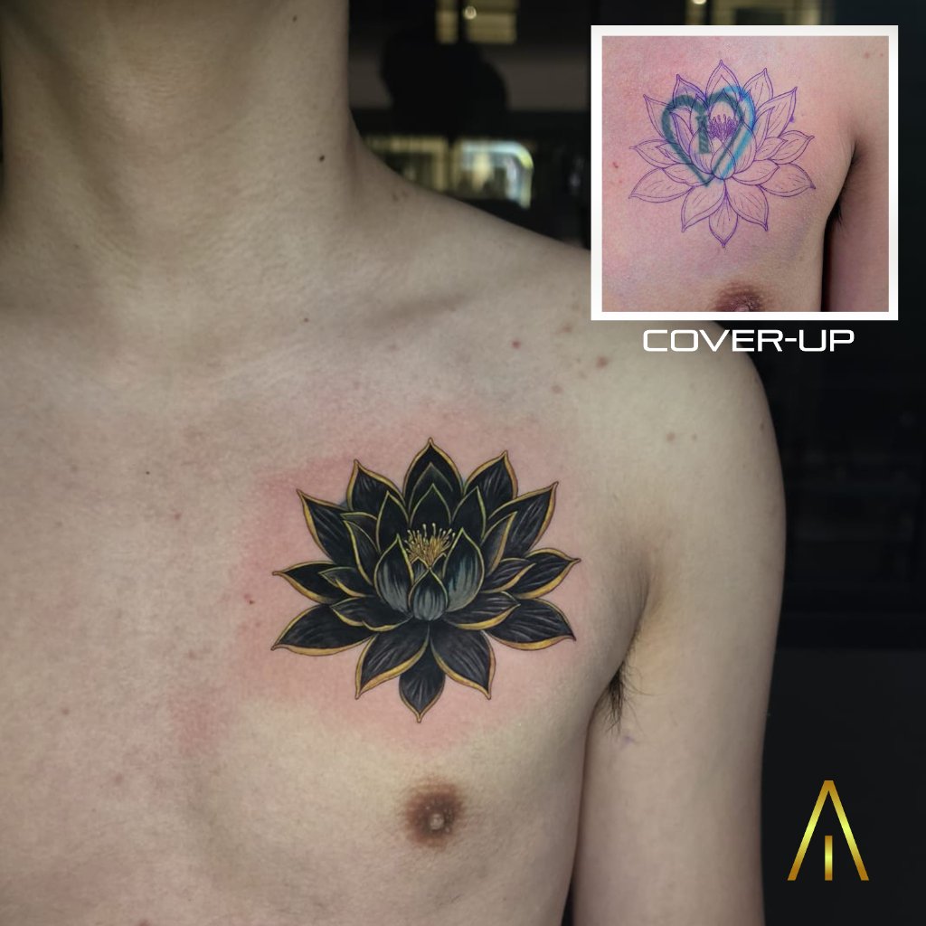 Blackwork lotus cover-up tattoo on the chest by Miaa, Artisan Ink Chiang Mai
