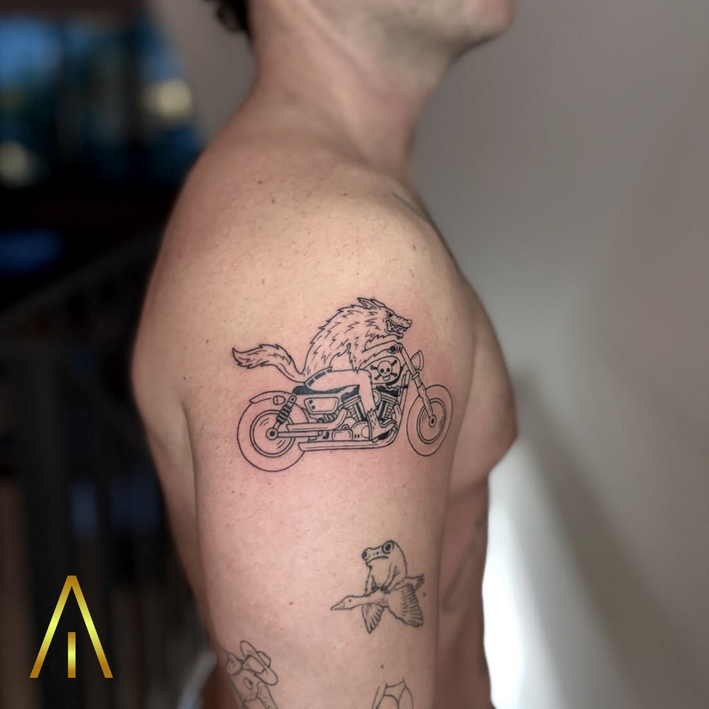 Fine line werewolf on motorcycle tattoo on upper arm Chiang Mai