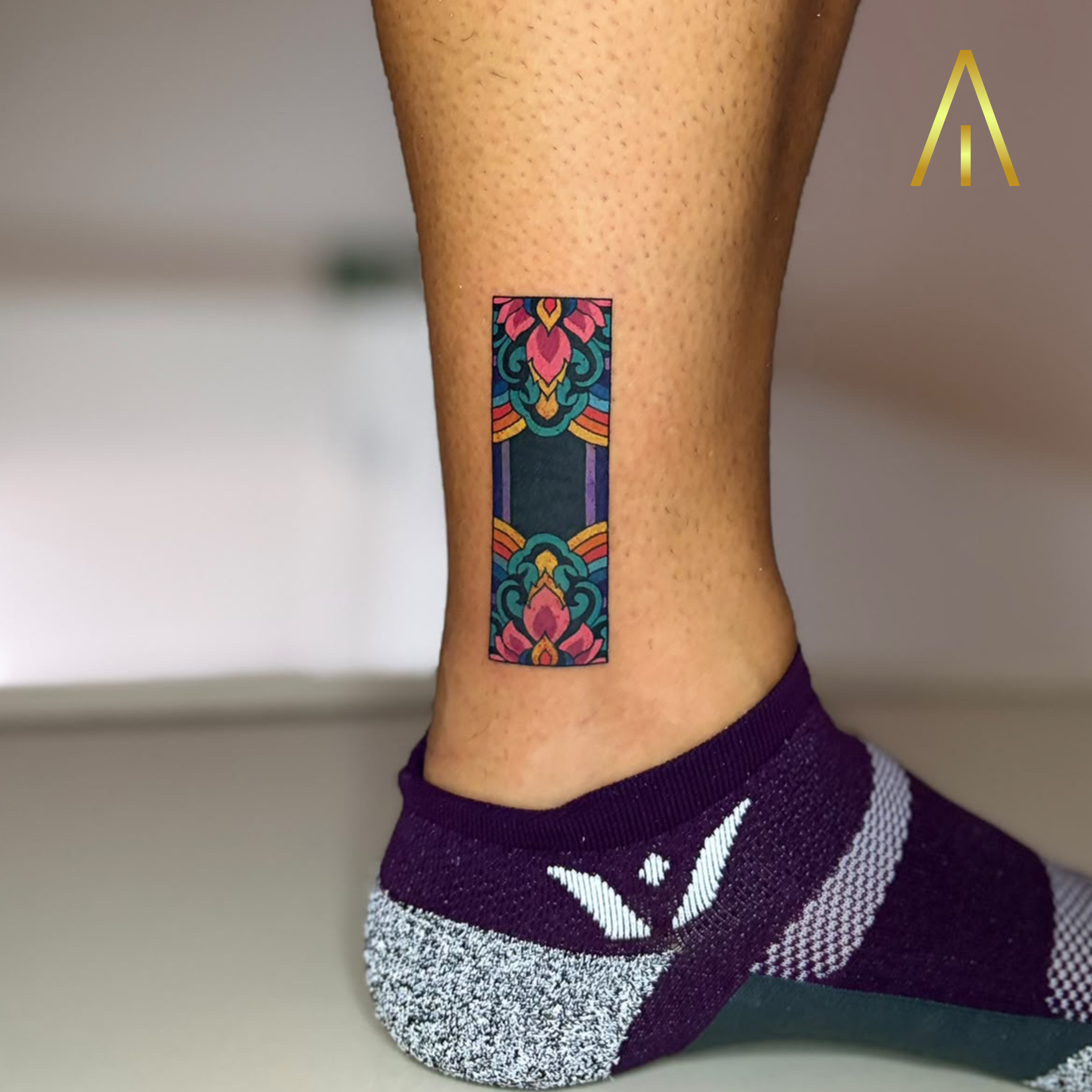Katie colour ornamental stained glass ankle tattoo Chiang Mai