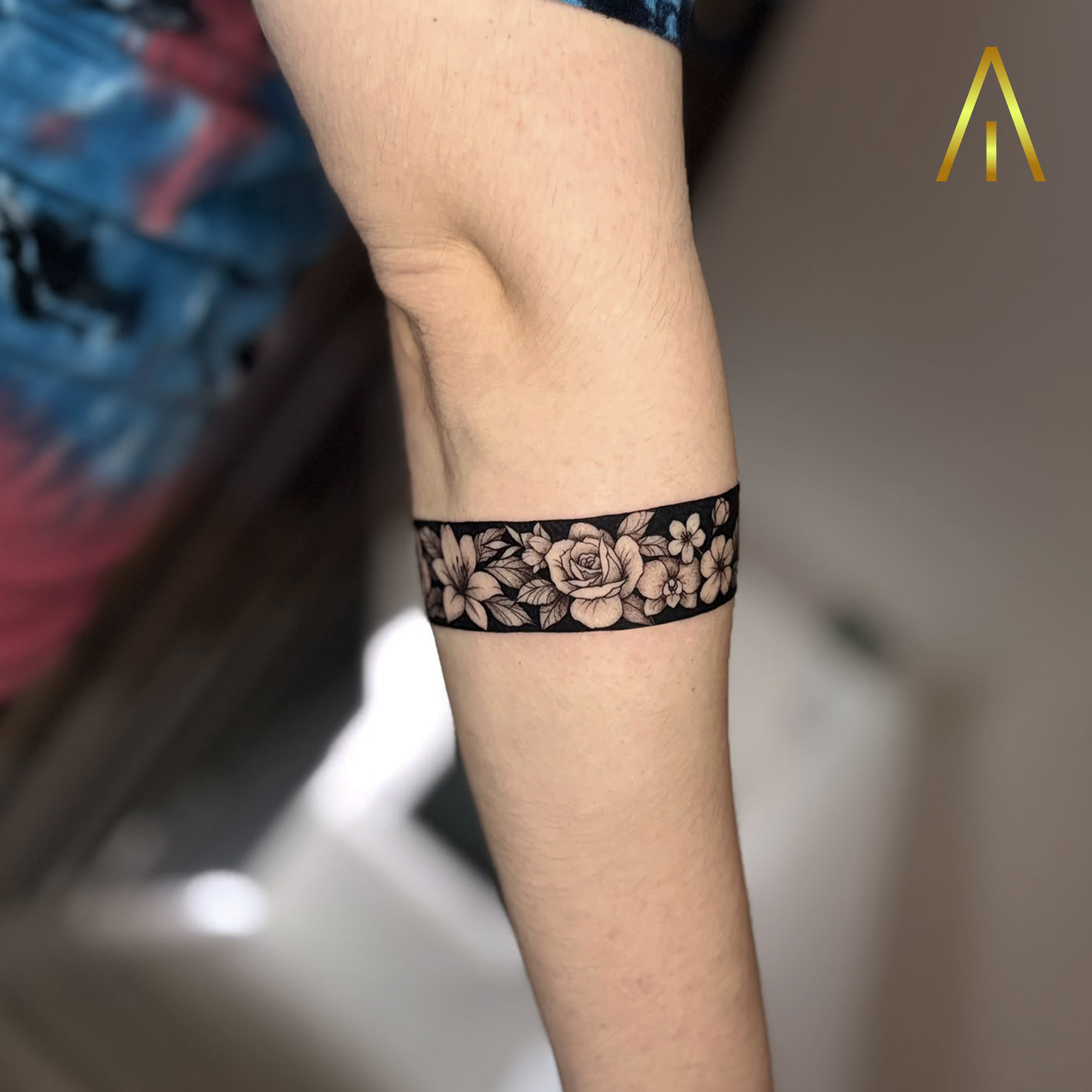 Miaa blackwork floral band forearm tattoo Chiang Mai