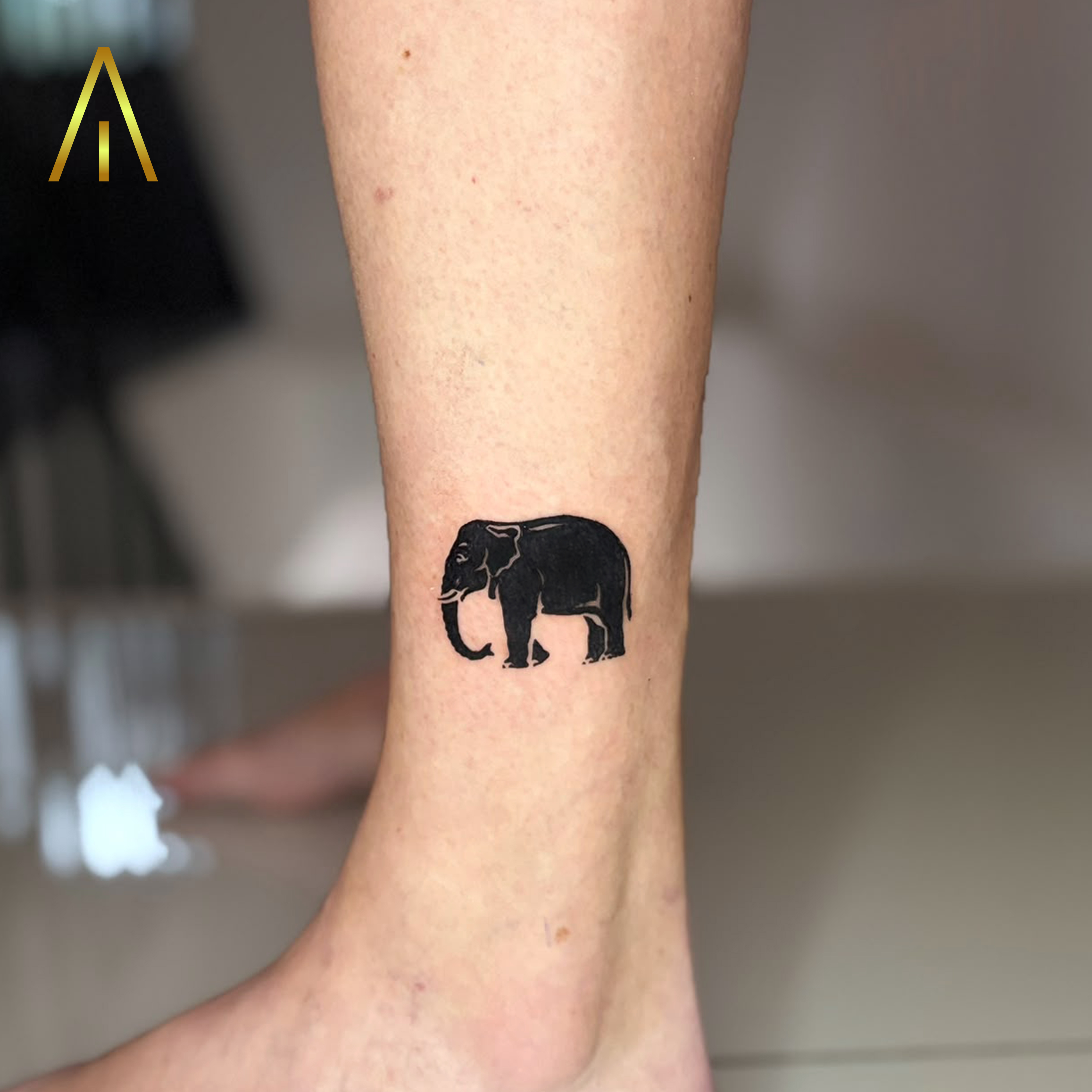 Mimi minimal elephant silhouette calf tattoo Chiang Mai