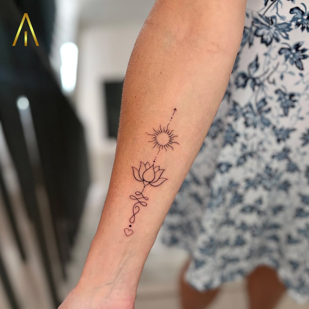 Fine line sun lotus unalome heart tattoo on forearm Chiang Mai