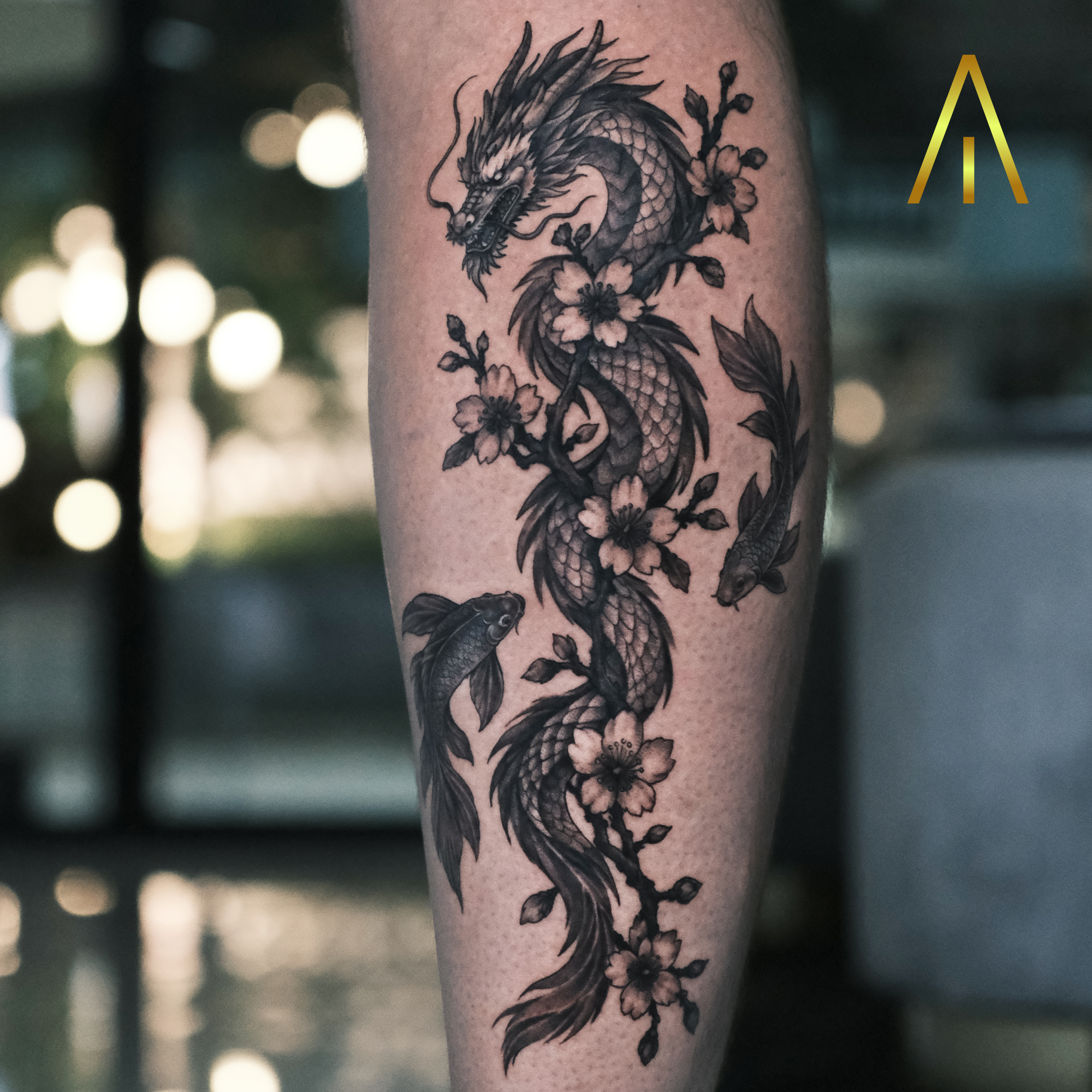 Katie Japanese dragon cherry blossom and koi fish black and grey calf tattoo Chiang Mai
