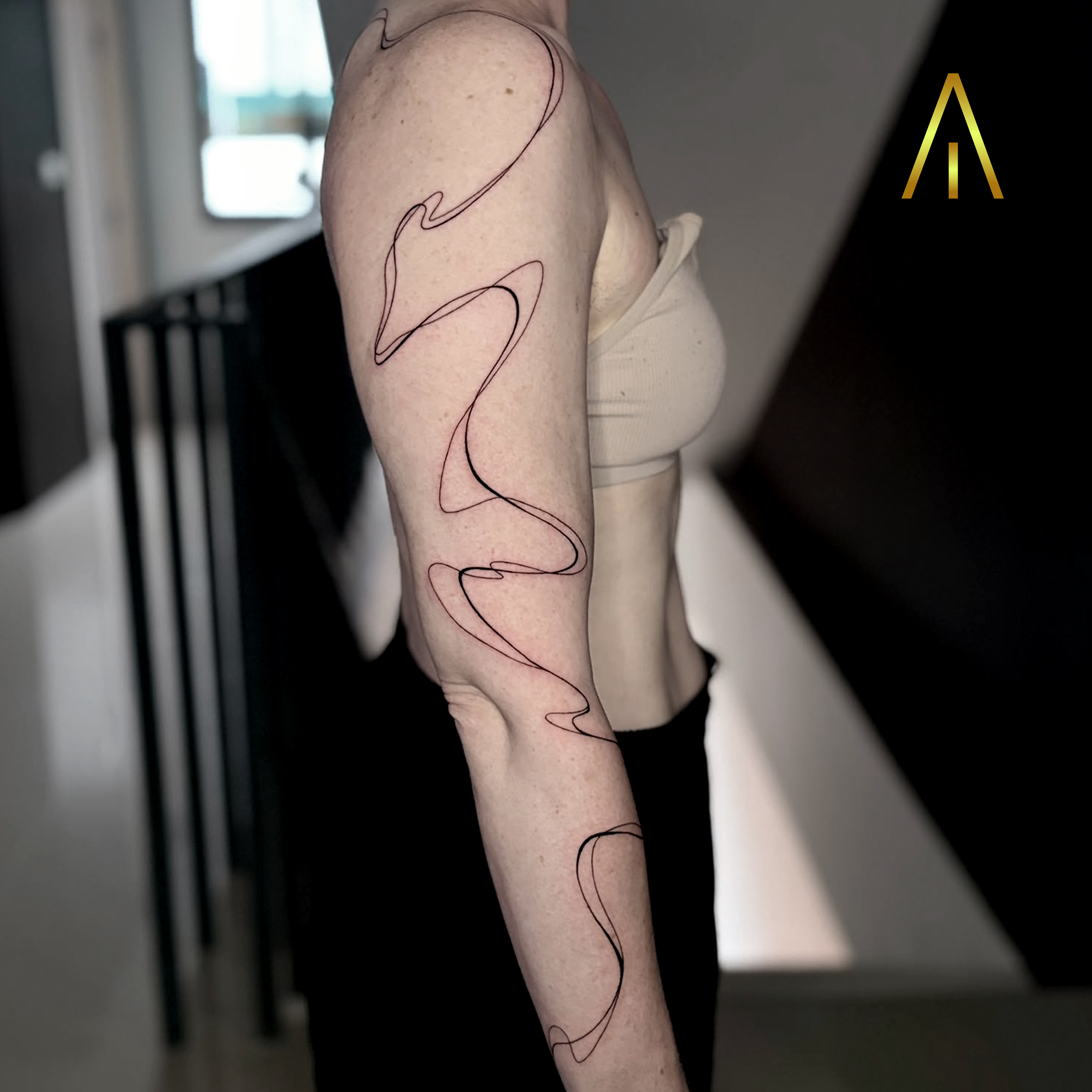 Mimi minimal wavy lines arm tattoo Chiang Mai