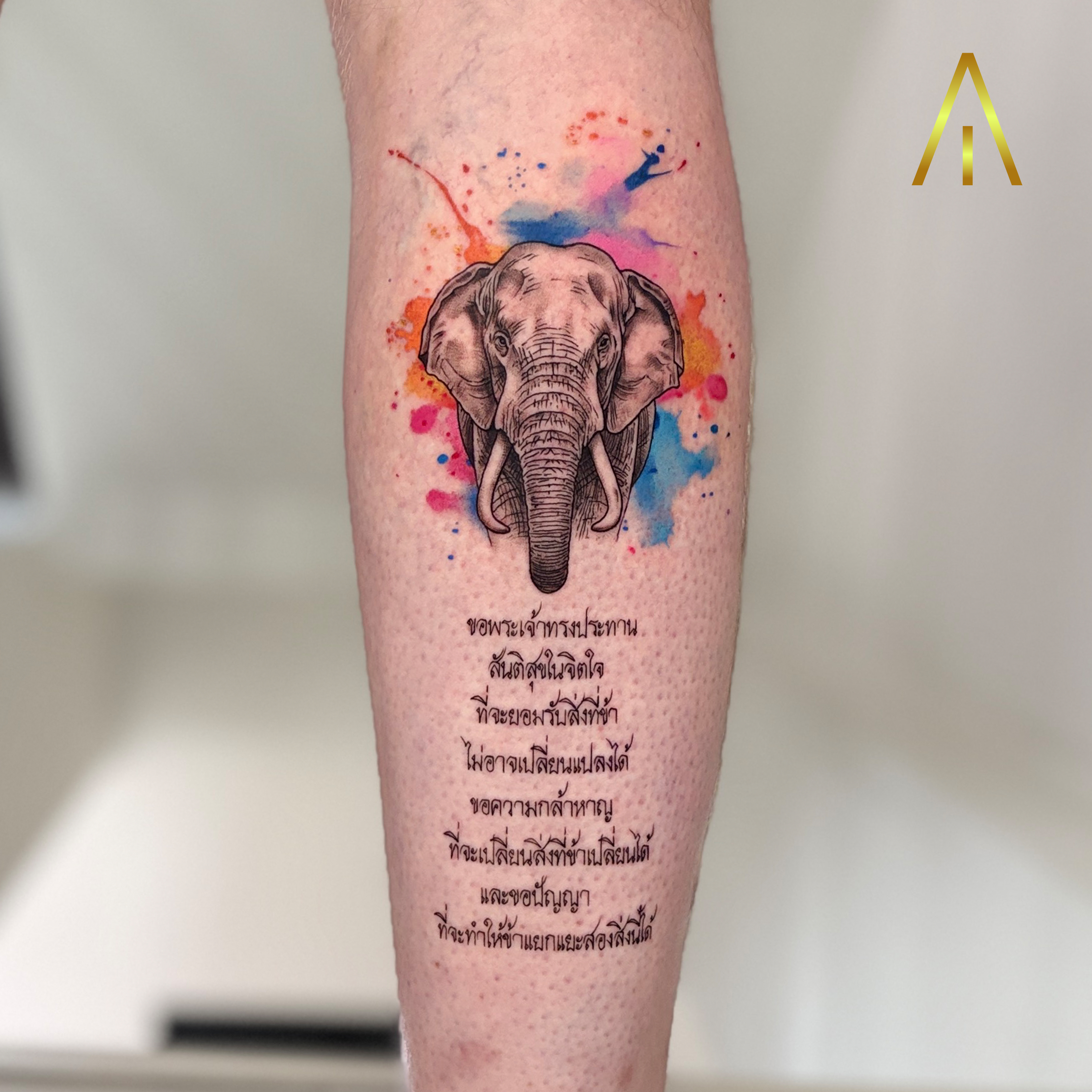 Elephant watercolor with Thai script colour tattoo by Katie Chiang Mai