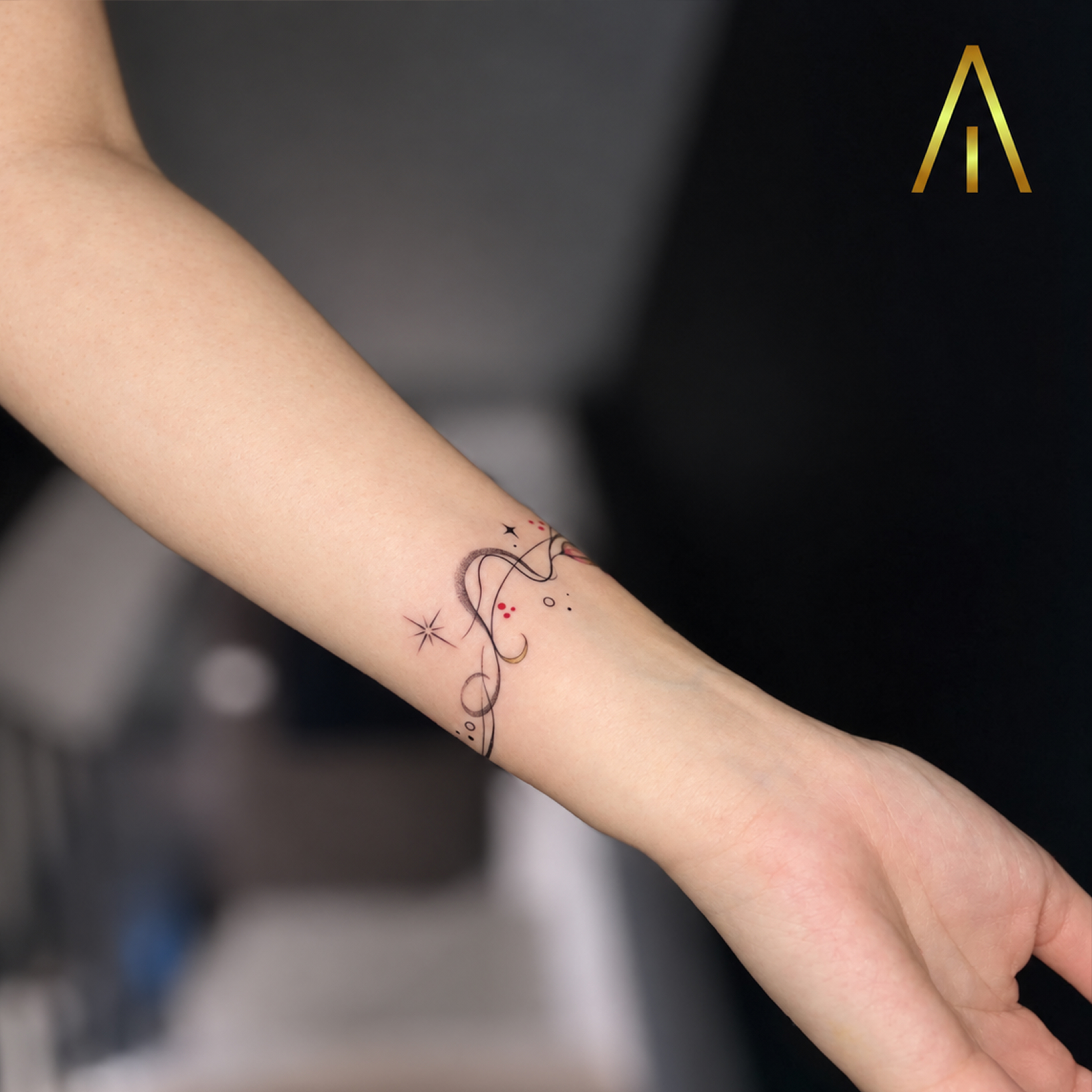 Miaa colour fine line abstract wrist wrap tattoo Chiang Mai