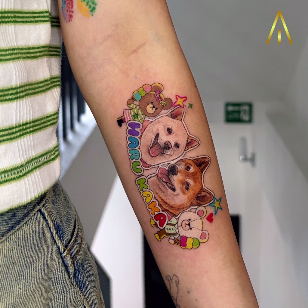 Colour cartoon dog portrait tattoo on the inner forearm by Miaa, Artisan Ink Chiang Mai