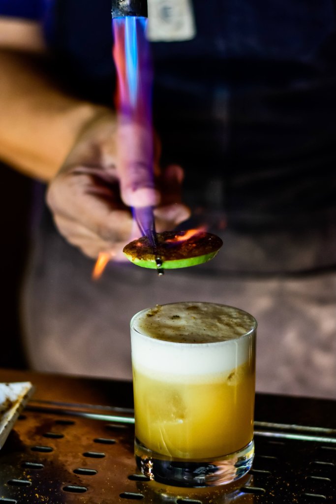 Cocktail being torched