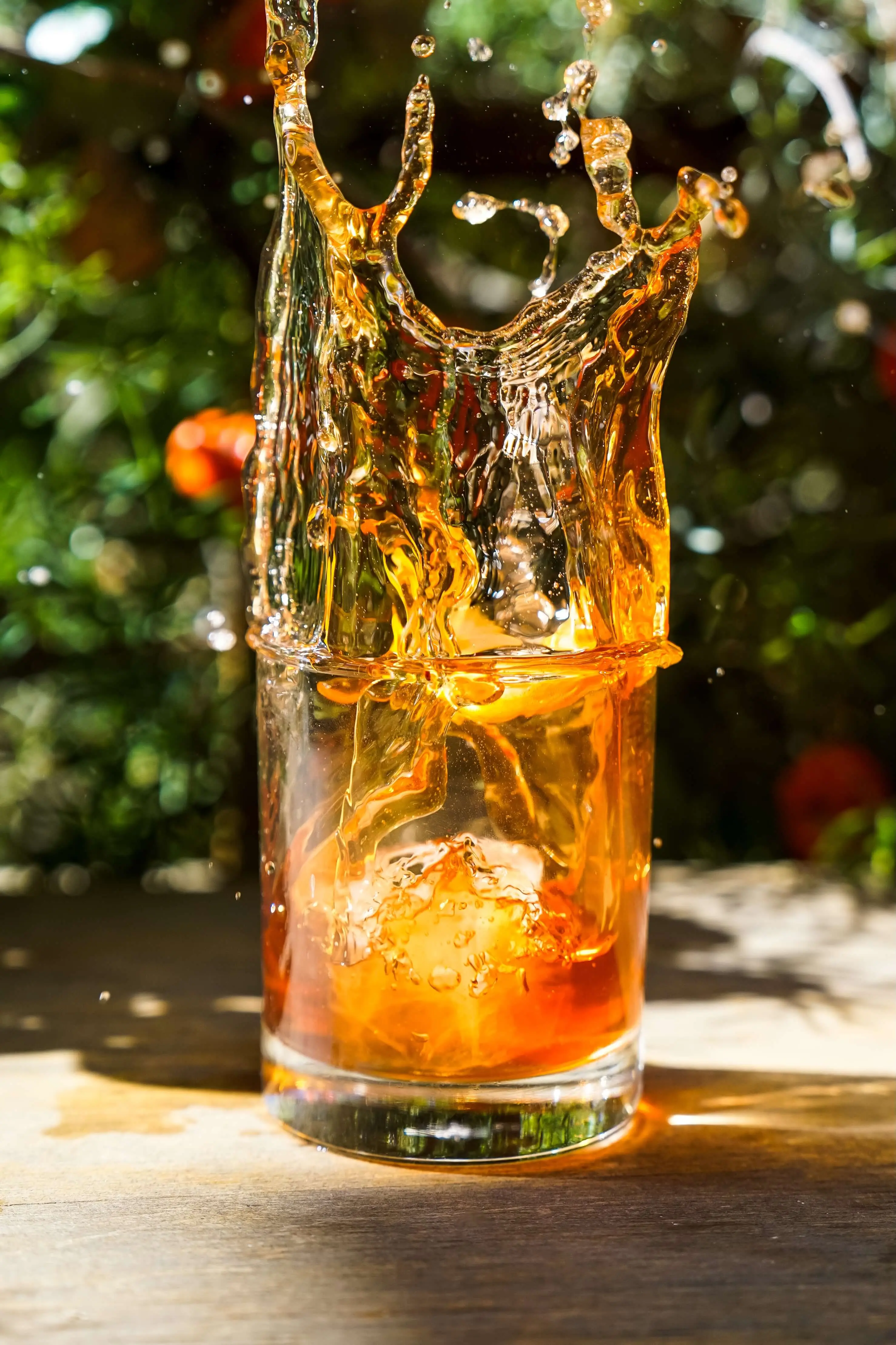 Whiskey splash over ice