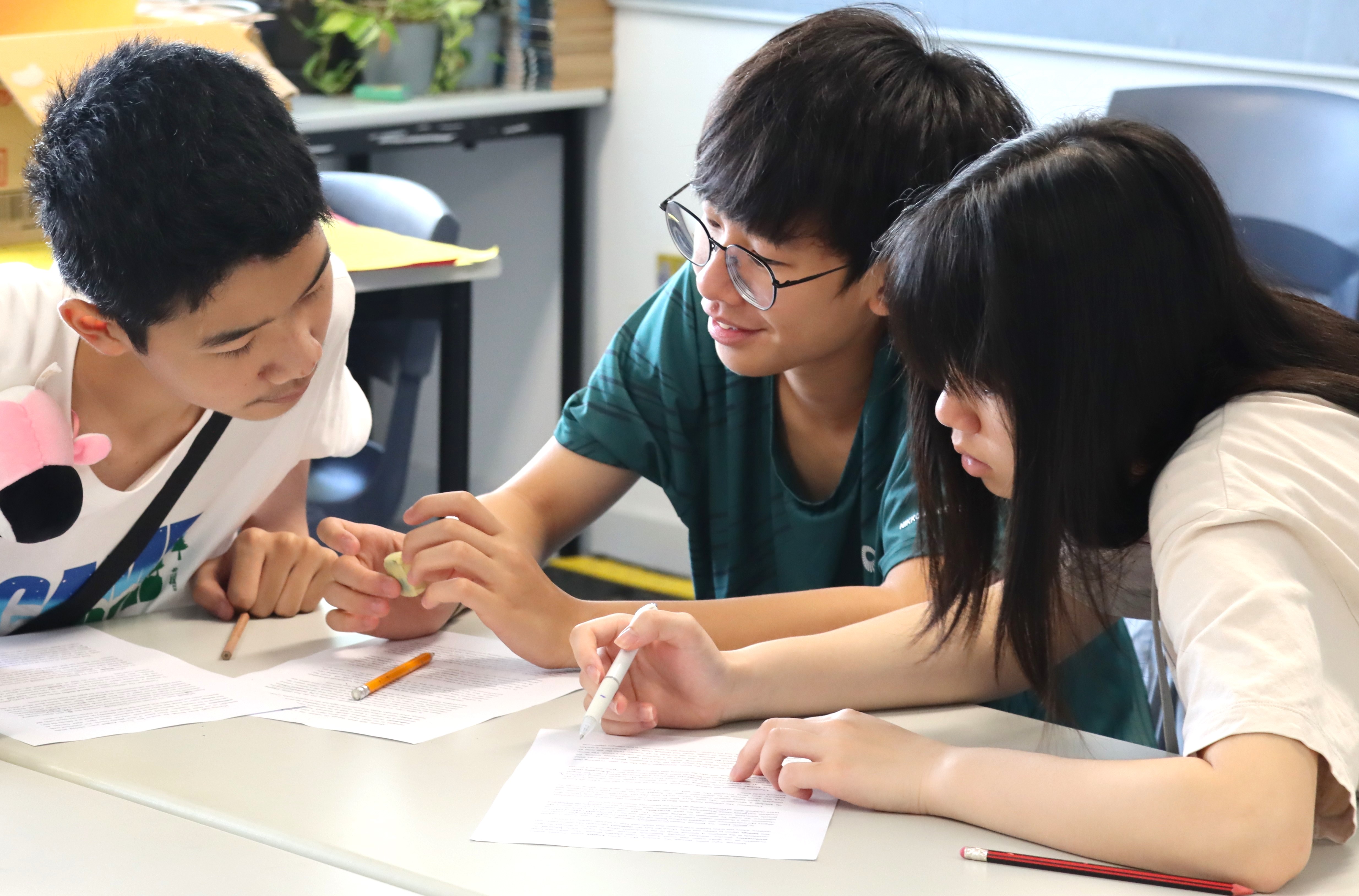 Students collaborating at a table