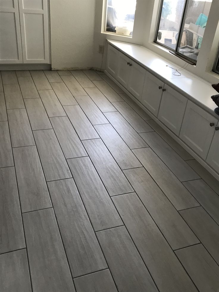 Gray Tile Flooring - Clean Modern Finish — Orellana Flooring KC