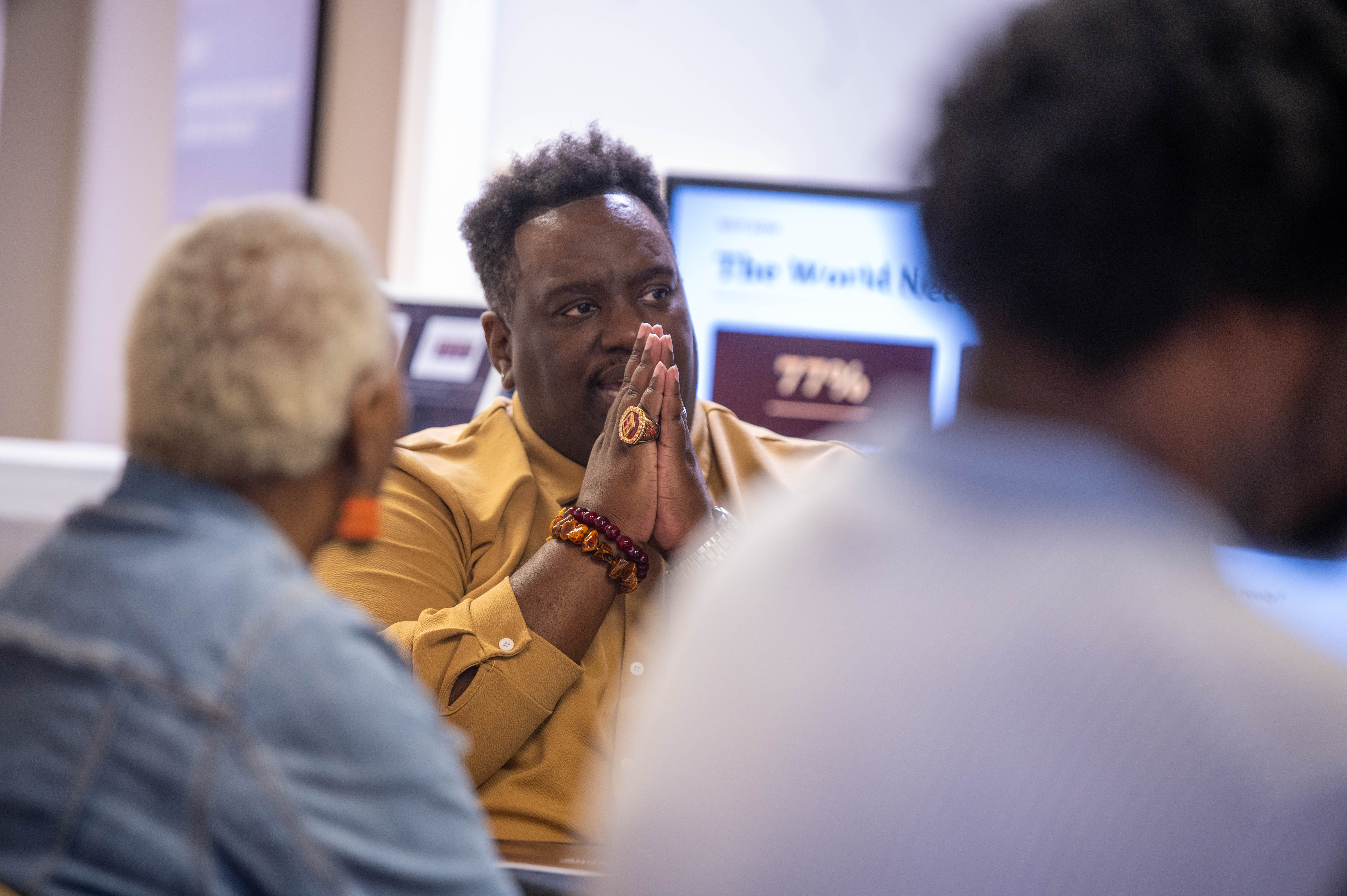 Terrance L. Culp listening intently to a participant during a CPS Masterclass small-group session