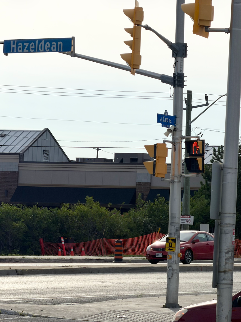 Hazeldean and Carp Road street signs at the intersection — Sheetal Narwal Ward 6
