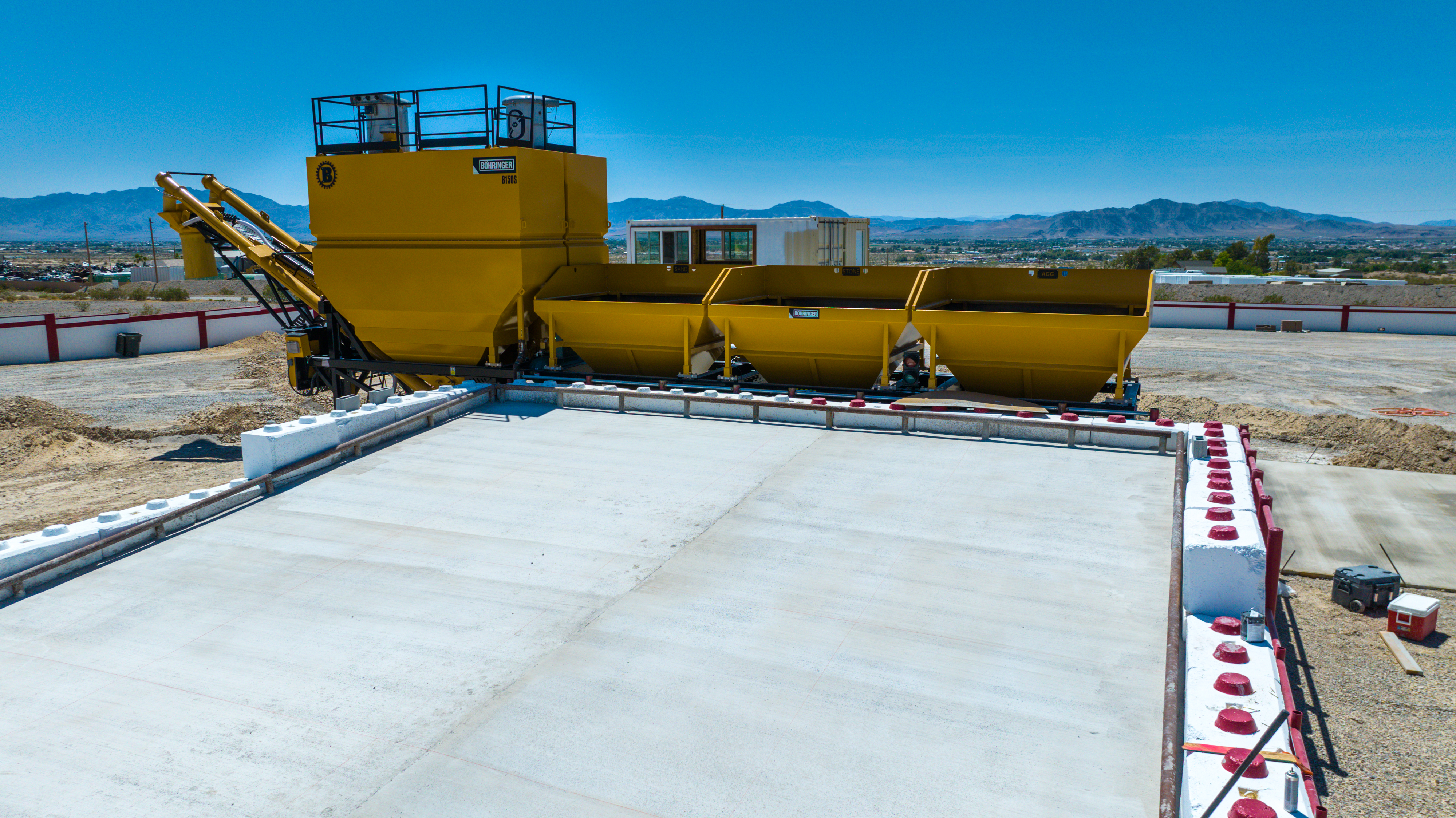 Ground-level view of concrete mixing assembly at Nye Valley Ready Mix