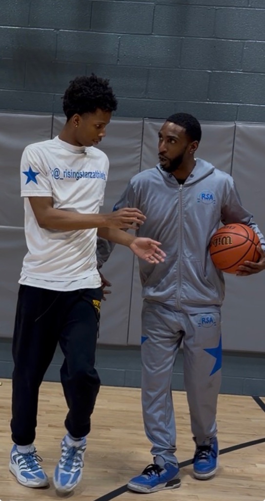 Coach J with athlete
