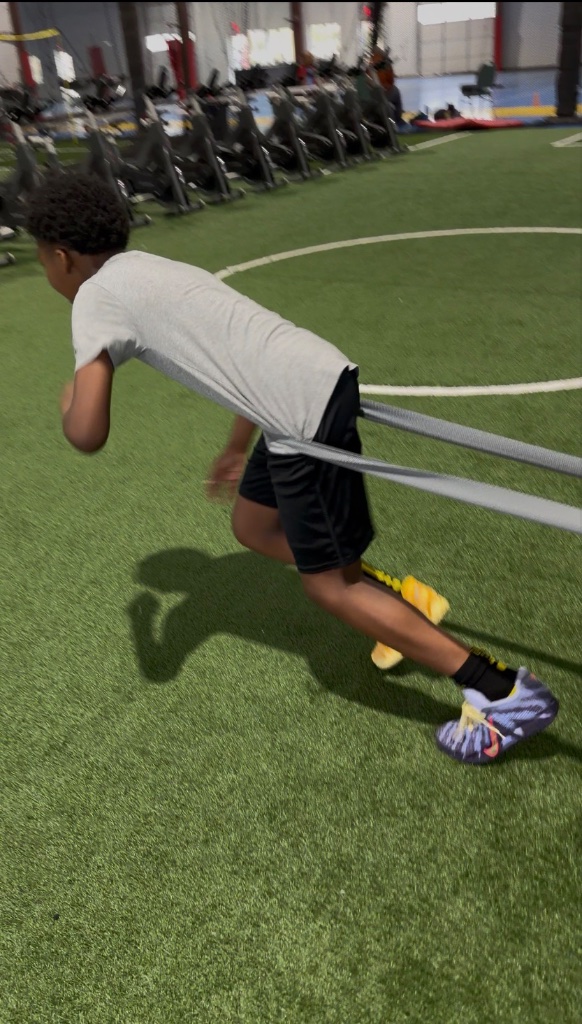 Athlete resistance band sprint training